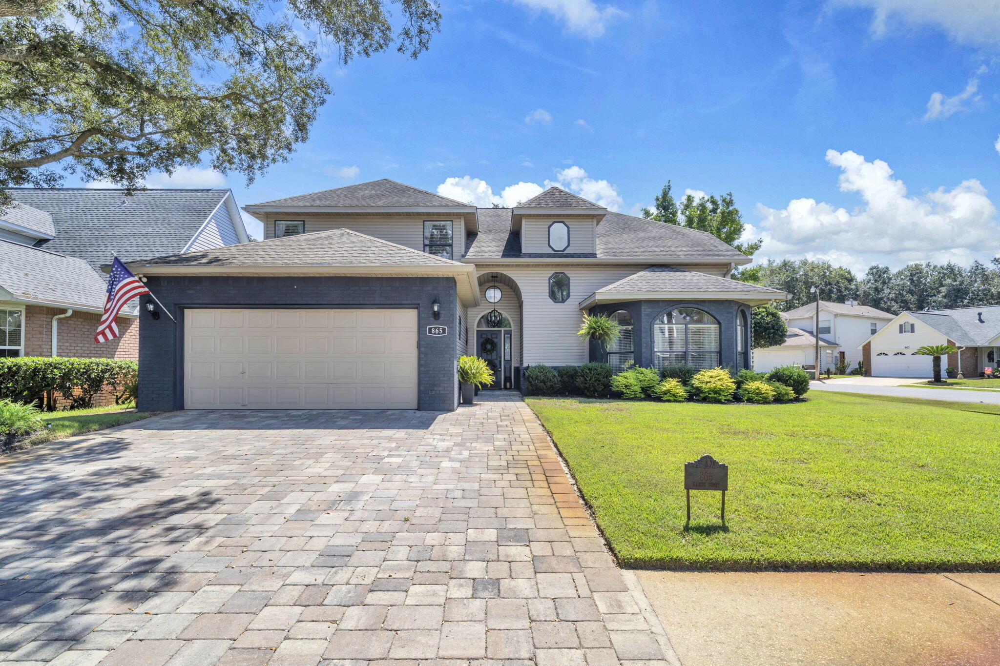 Professional photos uploaded. Updated home that is move-in ready featuring 4 bedrooms and 2 full and 1 half bathrooms that has been meticulously maintained and is in great condition. All new flooring and lighting fixtures were installed in 2020 and the kitchen was completely remodeled in 2020. This home offers a great floor plan with an open family room with fireplace, a formal dining room, a den and a large kitchen with breakfast nook. The kitchen features granite countertops, stainless steel appliances and a tiled backsplash. The spacious master bedroom is located on the 1st floor, along with a 1/2 bath and laundry room. The 2nd level features 3 bedrooms and 1 full bath and 2 large storage rooms. The exterior features exceptional landscaping and a large entertaining area in the back yard with a covered patio and an open. The rear yard / boundary abuts the community park.