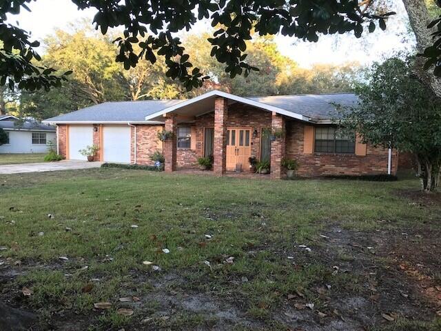 Look no further than 22 Marlborough Road in sought after Poquito Bayou Subdivision in Shalimar.  This 3-bedroom 2 bath brick home with private pool sits on a large fenced homesite directly across the street from beautiful Poquito Bayou. The location is 3 blocks from a waterfront neighborhood park, Poquito Bayou, with a boat launch.  Longwood Elementary School is located in the neighborhood, just a short drive or walk from this home. The roof is 7 years old, and the vinyl pool liner has been recently replaced. A 300 square foot interior space shown on the County Tax Records as storage, has been improved to include an additional toilet and shower. The home will be sold ''As Is''. At the list price of $330,000 the seller will provide up to a $10,000 Buyers Credit