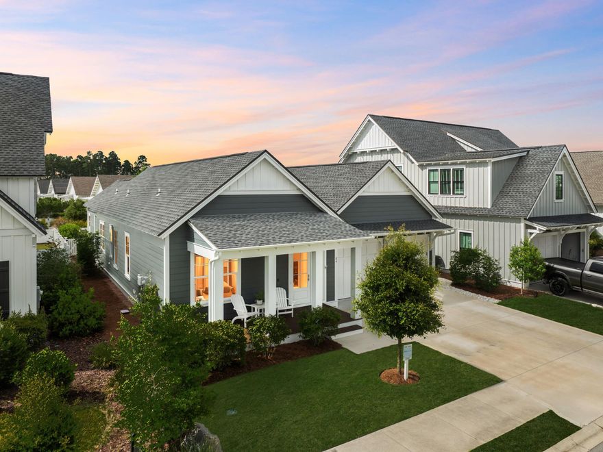 This newer construction lakeside residence is in the sought-after community of Stillwater at Watersound Origins. Beautifully constructed to the highest standards by Romair Homes, it boasts multiple upgrades and fine finishes that stand the test of time. Beyond the open front porch, light oak-engineered wood flooring leads the way into the open concept home, which is both light and spacious. Your eyes are immediately drawn to the upgraded nano wall that fully opens to extend the living space into the spacious screened porch. It's ideal for those who enjoy entertaining. Relax and enjoy a tranquil cup of coffee with views across the backyard to a picturesque pond that provides exceptional privacy and serenity. It's a calming view that never grows old. Elevated landscaping and an automated irrigation system keep the yard looking its best, even when owners are absent. The living room features a dedicated dining area adjacent to the gourmet kitchen. White soft-close cabinets, cool quartz countertops, and a pantry enhance this practical space, along with top-of-the-range Bosch appliances, including a 36-inch gas range. The central island has ample space for four stools, making it perfect for serving pre-dinner drinks and snacks. All on one level, this upscale Florida cottage has three stunning bedrooms and three pristine bathrooms. The master bathroom has a vanity with dual sinks, a frameless glass shower, porcelain tile, and a stunning oval tub for bubbly soaks. A two-car garage provides ample space for vehicles and beach toys. 

Days can be spent playing tennis, pickleball, and golf, or shopping and dining in the vibrant town center. Community pools are scattered throughout this well-maintained neighborhood. Five miles of walking trails are perfect for bicycle rides or leisurely strolls to the Village Commons and neighboring Conservation Park. The coastal communities of Alys and Rosemary Beaches provide additional opportunities for alfresco dining and entertainment, making this the ideal location for a primary or vacation home close to stunning gulf beaches.