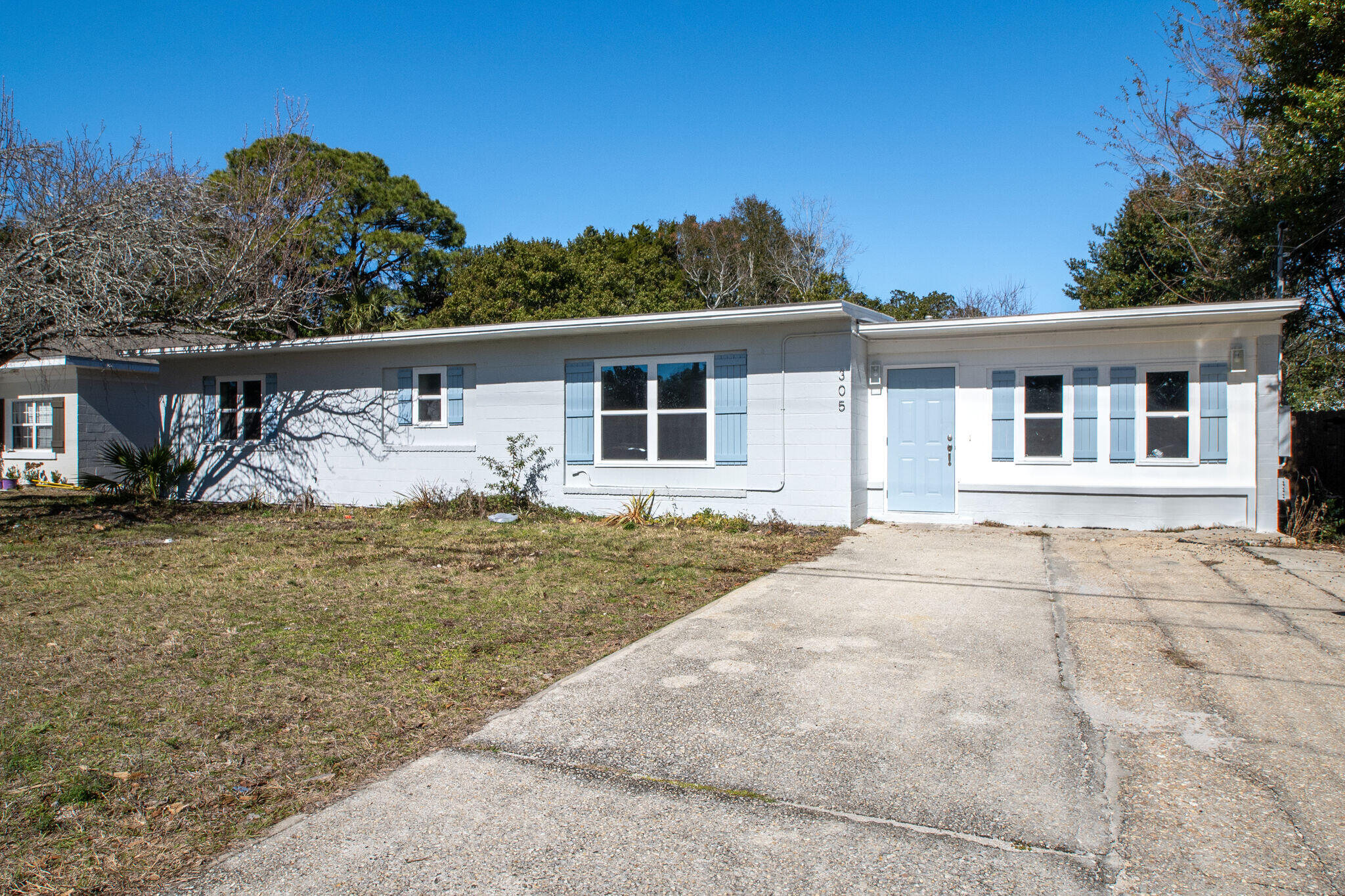 Great investment property or starter home in the desirable neighborhood of Elliott Point! Recently remodeled both inside and out to include new windows and doors, HVAC, roof, and hot water heater. A new kitchen, complete with granite countertops and stainless appliances. There is a screened in back porch with a fenced back yard. Convenient to Eglin and Hurlburt, beaches, parks, boat launches, shopping and downtown.