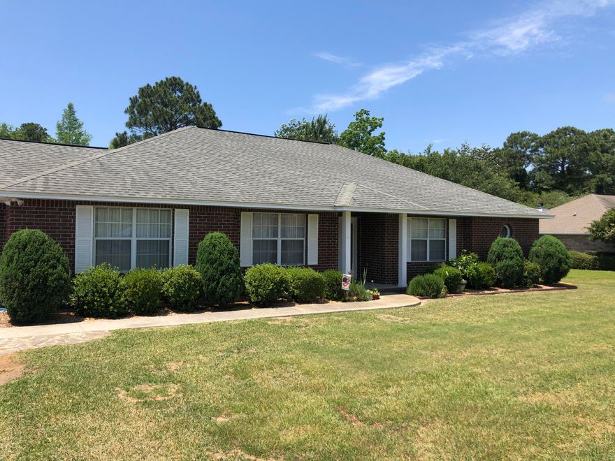 All brick 3 br/2 bath home. On approximately .81 acres in East Navarre.