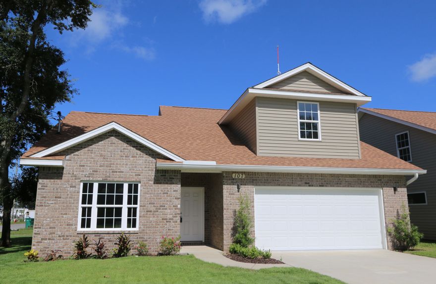 Great features in a new home that you just cannot find for this price!! Inviting open and bright floor plan...Lots of up-grades! Upscale fixtures and bull nosed corners... Features include granite counter tops and tile backsplash in kitchen and baths, large tile flooring, stainless steel appliances, and breakfast bar...Master bedroom is downstairs and master bath has double vanities and separate beautiful glass enclosed travertine shower! Partially fenced back yard and two car garage!