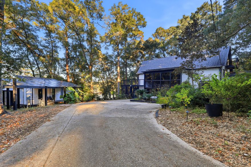 Discover the Pinnacle of Multi-Generational Lakefront Living! Welcome to 4578 Riley Road, a fully-renovated, solar-powered retreat where thoughtful design meets modern innovation. This extraordinary home is a rare find, offering two complete living quarters perfect for multi-generational families, an in-law suite, or ultimate guest privacy.This home shines with upgrades, including a fully-owned 14 kW solar system (completely paid off) with whole-home battery backup. Enjoy the best of lakeside living with the rare security of being high and dry--not in a flood zone. Step inside the main floor to a beautifully open layout with new laminate flooring. The chef-inspired kitchen is the heart of the home, boasting Samsung stainless steel appliances, quartz countertops, and custom cabinetry. This level also features a reimagined primary suite with a private ensuite bath. Above, the expansive loft has been transformed into a bright home office, complete with a half bath and its own mini-split for perfect comfort.

The completely refurbished lower level is a home unto itself. It features a second primary suite with an ensuite bath and walk-in closet, a second, fully functional kitchen, and a spacious open living area. This private retreat offers endless possibilities.

Enjoy Florida living at its finest on the new composite decking with stainless cable railings or from the comfort of the screened patio. The property's incredible features continue with a 16??38 detached building (featuring a workshop and climate-controlled gym) powered by its own 5 kW Bluetti solar battery system!

Complete Upgrades This move-in-ready home includes:
New Roof & Chimney (2022)
Updated HVAC Throughout
New Water Heater & Electrical Panel
8??10 Garden Shed
8??10 Glass Greenhouse
Tucked away on over an acre, this property perfectly balances efficiency, functionality, and Florida charm. Homes with this level of flexibility, power, and high-end upgrades are a rare find. Schedule your private tour today!