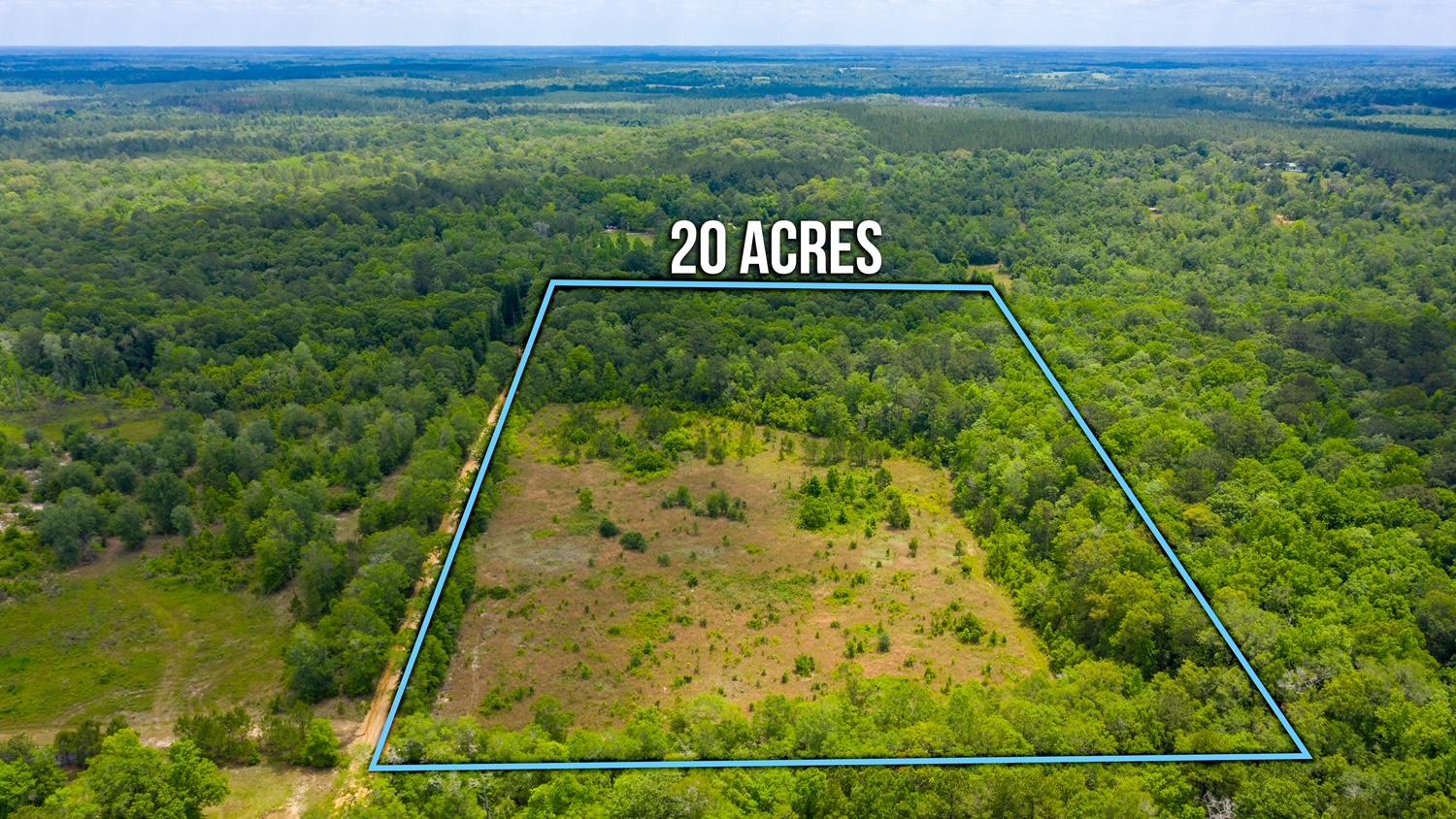 WANNA GETAWAY!! Get away from it all and build your dream home on this secluded 20 acre paradise. This 20 acre tract offers privacy, wildlife , and two creeks. There is an existing deep well located on this parcel. Plant your garden, bring the side by sides, atv's, tractor, and enjoy all the outdoors that the country life has to offer. There are two driveways on each end of this property coming off Otter Creek Rd. This land adjoins Vortex Springs Property. Less than 1 hour to World's Most Beautiful beaches!!!