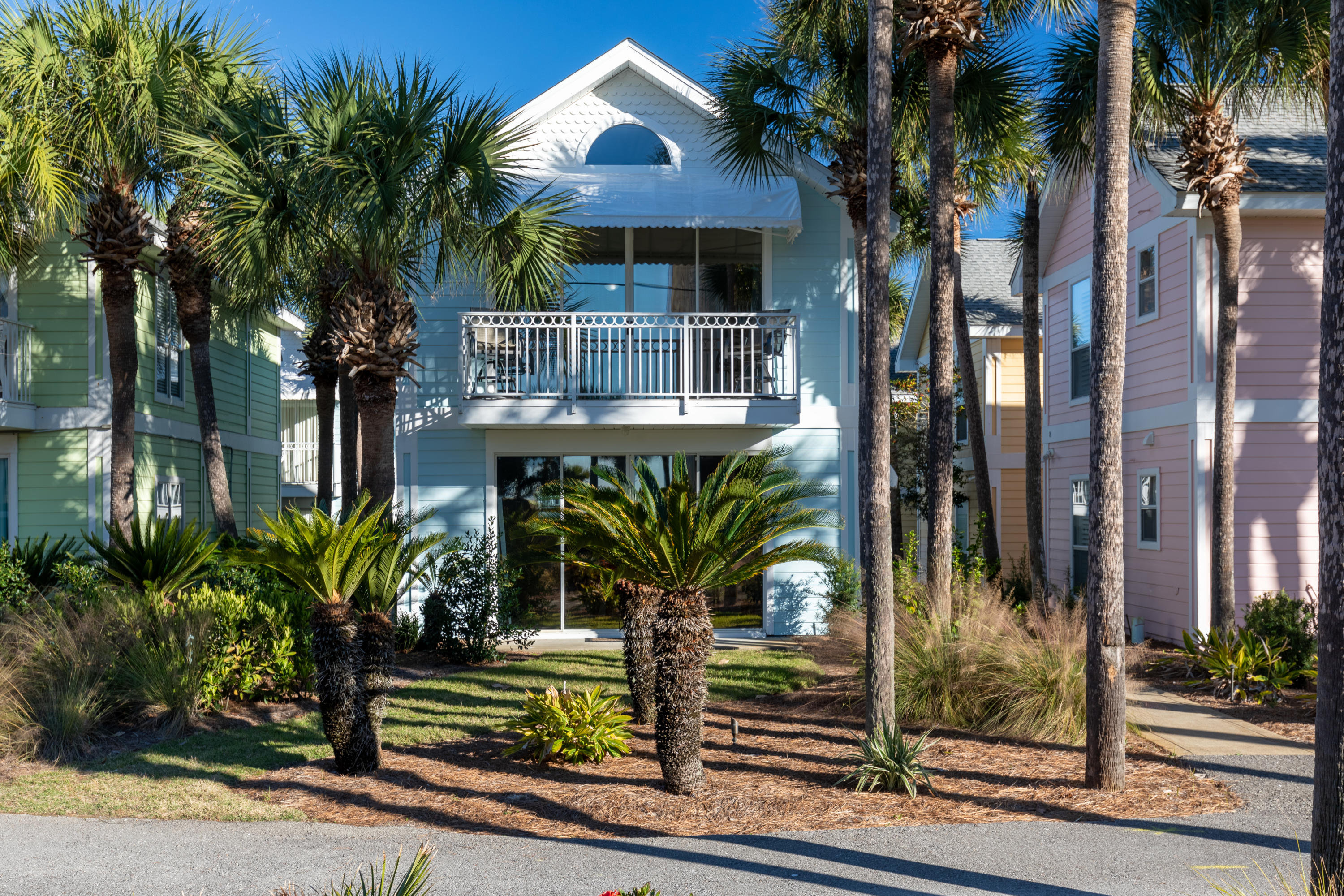 Enjoy Gulf Views and Relaxing Breezes from this beautiful Cottage that is located just steps away from the turquoise waters and white sands of the Gulf of Mexico. The unique and desirable floor plan provides multitudes of rental possibilities and similar cottages have generated in excess of $50,000 in gross rentals. The owners have recently invested heavily in significant upgrades including new paint, countertops, stainless appliances, and furnishings. The lock-out style bungalo consists of two levels with each containing a full kitchen, bedroom, and bunk area that is well appointed and decorated in the current coastal style and colors. The very popular SCENIC 98 bicycle/walking trail is conveniently accessed from the front patio while fine dining and shopping is nearby. The exterior was