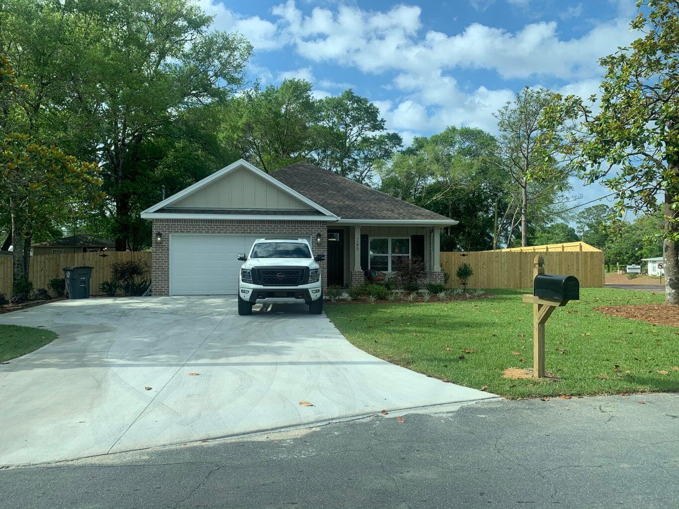 Welcome to this beautifully maintained 4-bd, 2-bath home built in 2021, located just minutes from Eglin AFB. Featuring a thoughtfully designed split floor plan, which offers both privacy and functionality, perfect for families or those who love to entertain. Stylish LVP flooring throughout this bright and open layout. The heart of the home includes a spacious living room that flows seamlessly into the dining area and modern kitchen. Enjoy year-round comfort in the heated and cooled Florida room -- the perfect spot to relax or set up a home office, playroom, or additional entertainment space. Outside, the large fenced yard offers plenty of room for pets. A yard building provides additional storage, with ample space on both sides of the house to park an RV, boat, & trailer -- a rare find!