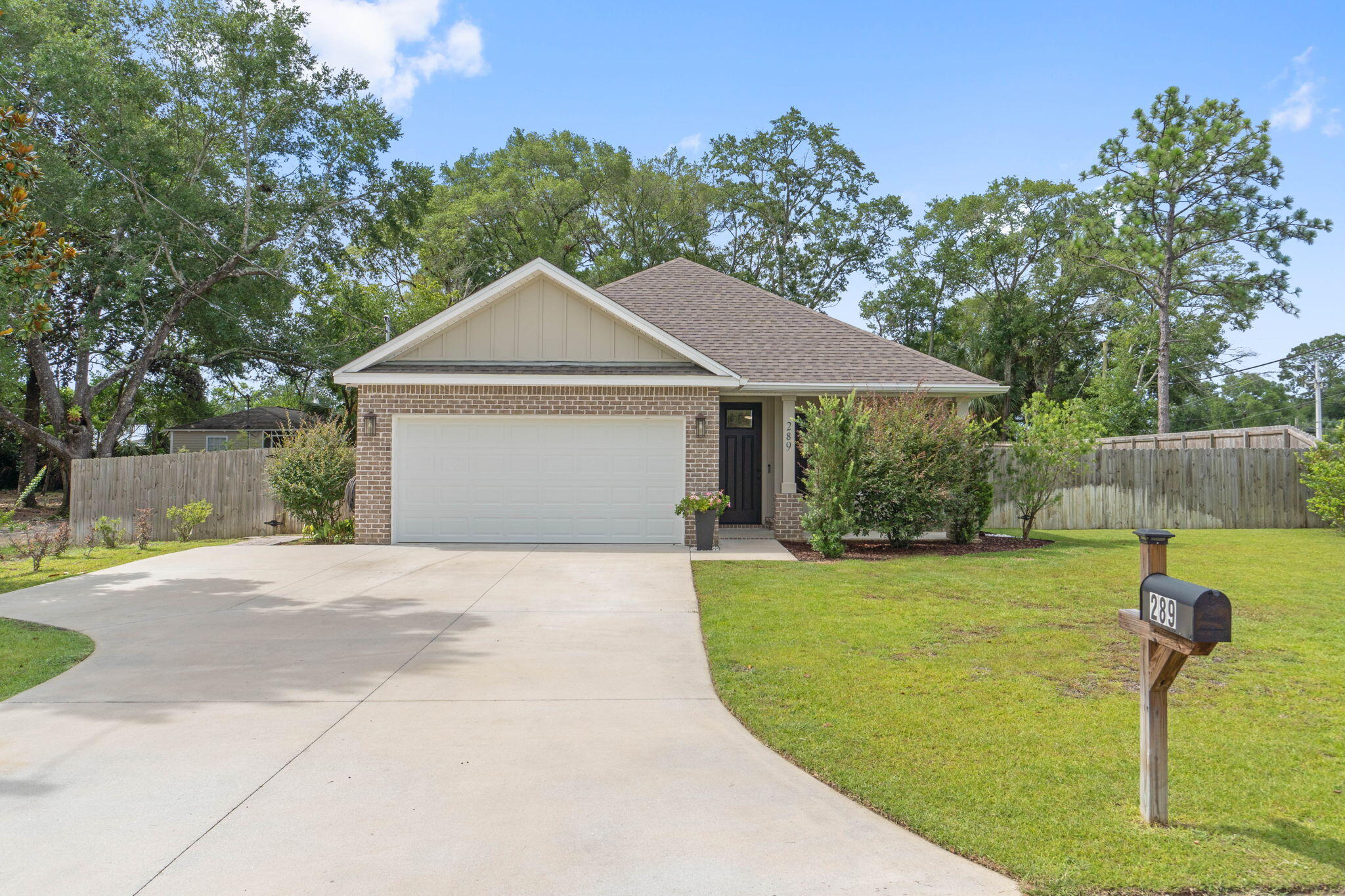 Welcome to this beautifully maintained 4-bd, 2-bath home built in 2021, located just minutes from Eglin AFB. Featuring a thoughtfully designed split floor plan, which offers both privacy and functionality, perfect for families or those who love to entertain. Stylish LVP flooring throughout this bright and open layout. The heart of the home includes a spacious living room that flows seamlessly into the dining area and modern kitchen. Enjoy year-round comfort in the heated and cooled Florida room -- the perfect spot to relax or set up a home office, playroom, or additional entertainment space. Outside, the large fenced yard offers plenty of room for pets. A yard building provides additional storage, with ample space on both sides of the house to park an RV, boat, & trailer -- a rare find!