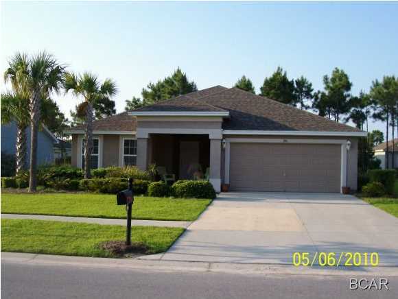This 3BR/2BA home is located in the newer section of Palmetto Trace and close to the rear entrance by Pier Park...much easier to get in and out of the neighborhood at the traffic light. Many people love the split floor plan and openess from the kitchen to the main room. The dining room is just off of the kitchen and tiled for ease of maintenance. What a great price for a home in a wonderful neighborhodd with community pools and close to Pier Park, Frank Brown Park and the beach!
