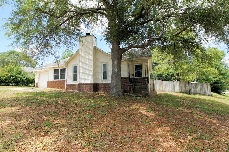 EXCELLENT location, ideal starter home at A GREAT PRICE! High and dry, this charming piece of property sits atop a hill on a corner lot in a great neighborhood on the southside of Crestview. Minutes from Duke Field, Eglin AFB and a straight shot to the beach, here is your opportunity to make this house a home! 3 bedrooms, 2 bath, one car garage, dining room, wood burning fireplace, nice sized backyard, indoor utility room. Schedule your showing today!