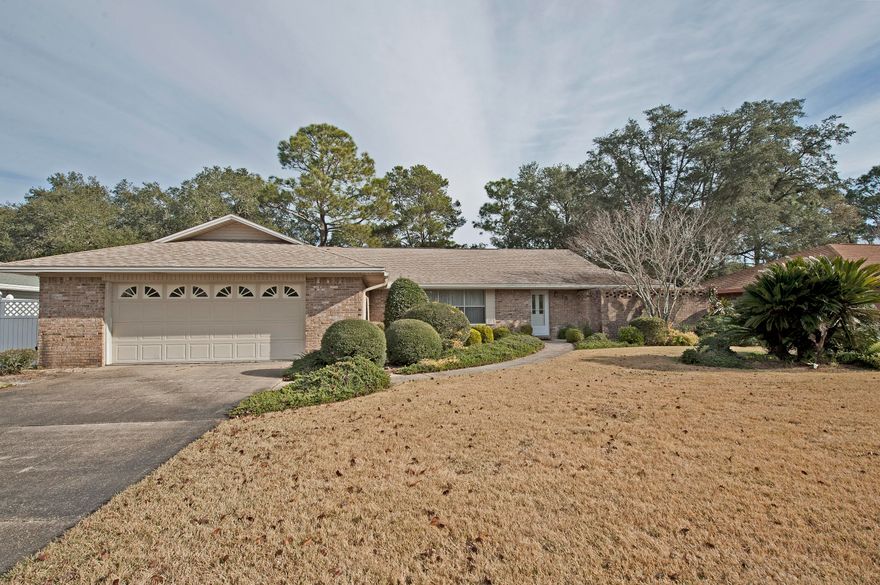 Price Reduction on this beautiful home is located on the Golf Course in Lake Lorraine Estates. 3 Bedroom, 2 Baths with a split floor plan. So many design opportunities with large formal living room, great room, separate dining area, spacious kitchen with tons of cabinets and a breakfast area. Enjoy this HEATED AND COOLED FLORIDA ROOM nearly 450sqft! This will make a great entertainment room, game room and so much more! Master Bedroom,walk in closet, Master bathroom with sliding glass entry to a private garden area ready for your DYI CREATIVITY. Located minutes from shopping beaches and Air Force basis. Don't miss your opportunity to take this move in ready home and make it yours!