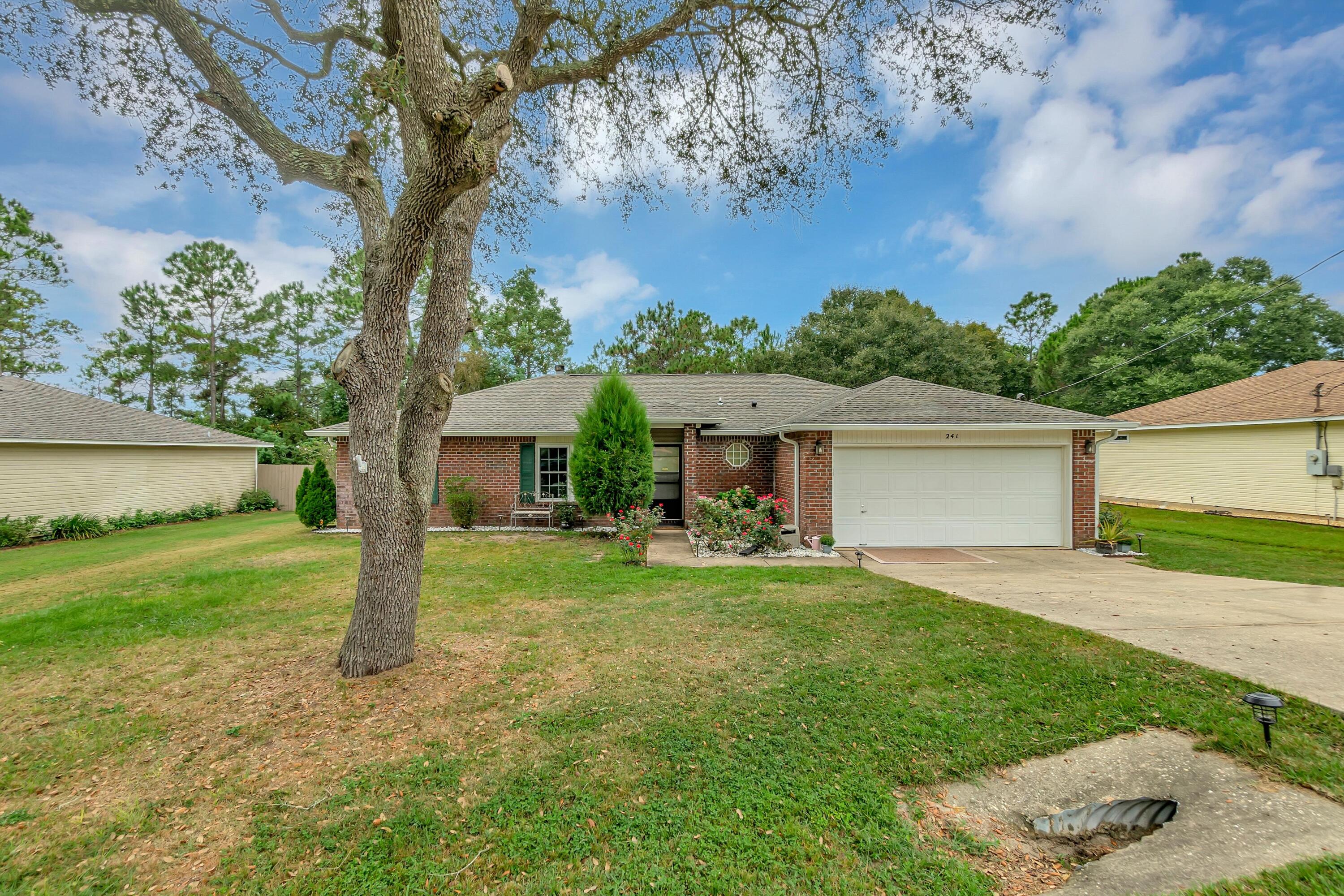 This charming 4 bedroom, 2 bathroom contemporary home is located in Countryview Estates, and is conveniently close to everything that Crestview has to offer, including an easy commute to military bases, schools and shopping. This property offers a 2 car garage, 1,552 sq. ft. of spacious elegance, a large fenced backyard that cannot have anything built behind it, and 0.35 acres of privacy at the end of cul-de-sac. This residence embraces an open floor plan, and features an elongated kitchen with matching appliances, split bedrooms, and no HOA, just to name a few. The well-kept home is in great condition, and has new vinyl insulated windows, replaced roof from 2021, recently added seamless rain gutters with leaf guards, as well as fresh landscaping. Don't miss out on this opportunity!