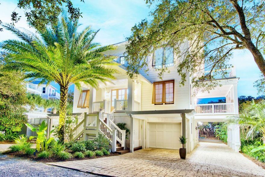 This Geoff Chick-designed beach home is one-of-a-kind for Scenic 30A. The three-story home has four bedrooms and fourt and a half bathrooms, and is nestled on a quiet, private street south of Scenic 30A in Blue Mountain Beach. The current owners installed a salt water pool and ample patio space surrounding the back of the home that is ideal for soaking up the Florida sun, as well as a climate-controlled wine room.  There is a full bar on the ground floor with fold-away doors to allow open-air entertainment. The bar room has an ice machine, beverage coolers and everything a mixologist will need for happy hour. Gulf views abound from the top floor porches. The second floor of the home is the main living and entertaining area with beautiful pine floors and high ceilings.
