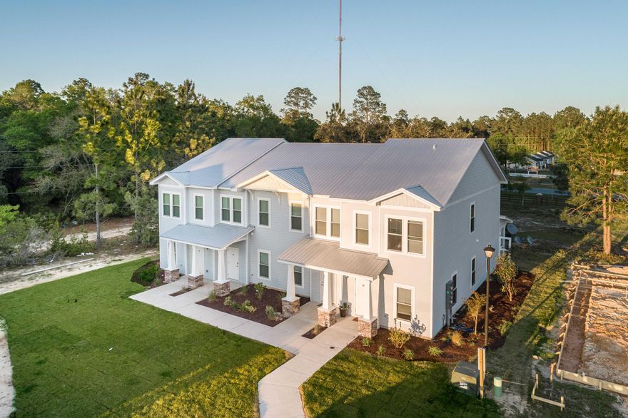 NEW CONSTRUCTION!! The Verandas at Freeport are continuing their buildout of this beautiful townhome development. This is a great opportunity for you to own a piece of this brand new multi-family townhome development. This four-plex unit consists of (2) 3BD/2.5BA units. (2) 2BD/2.5BA units. These units will include Metal Roofing, Hardie Board Siding, Engineered Vinyl flooring throughout the house, Stainless Steel appliances, Granite countertops, 14 Seer air conditioner units, Open Floor-Plans, Craftsmen-style trim and much more. These units will make for a great Investment opportunity. Freeport is consistently growing and is not showing signs of slowing down anytime soon. Don't miss your chance to own an 4-Plex in The Verandas!