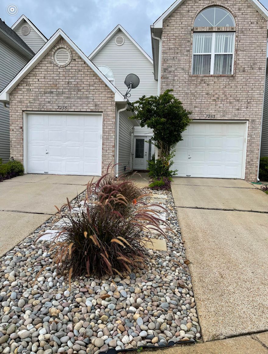 OPEN HOUSE SATURDAY SEPTEMBER 17th 1-3. NEW PRICE NEW FLOORING upstairs NEW FRONT DOOR. WATERFRONT COMMUNITY! Looking for a little get away? This cute 2 bedroom 21/2 bath unit is just what you have been looking for. Centrally located in Navarre near golf course, schools, and shopping, with community sitting on East Bay. Step inside your new home with improvements being AC, hot water heater, Tile in living area, kitchen sink, two bath room sinks, garage door opener, light fixtures ( down stairs) and landscaping in front. Upstairs has new CARPET AND VINYL. Each bedroom has its own private bath. Close to Hurlburt Field and Eglin AFB, minutes to the sugar sand beaches of Navarre and WATERFRONT community with community pool. Calling for your showing today!