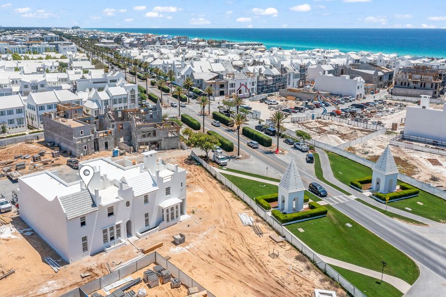 Designed by Gary Justiss, this 4-bedroom, 4 full bath, 2 half bath home offers 3,138 square feet of well-planned living space in one of Alys Beach's most desirable areas. On the first floor, the living room and kitchen open directly to a covered outdoor living area, creating a seamless indoor-outdoor flow. This space includes a summer kitchen, dining area, and adjacent to the outdoor courtyard with private pool with stairs to a second floor private terrace. A large Primary Bedroom & Bath are prominently positioned on the first floor.  The second floor offers a sitting area with beverage center that connects to a second outdoor living space. A secondary Primary Bedroom & bath anchor the second floor.  Adjacent to the Sitting Area a stairwell delivers you to a third-floor rooftop terrace,