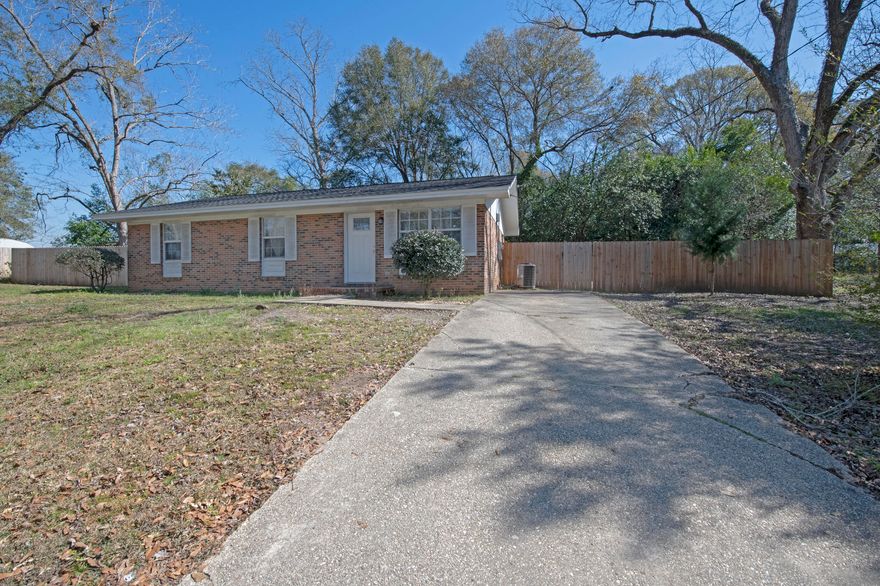 Gorgeous 3/1 home in Baker, Fl on a large lot, centrally located within walking distance to Baker School, grocery store, and about 10 minutes from Crestview.  It boasts all new luxury vinyl plank flooring throughout the entire house, brand new windows, doors, paint, light fixtures and moulding. The kitchen has been completely remodeled with high-end custom cabinets, granite countertops, crown moulding, recessed lighting, brand new appliances and fixtures. The bathroom has been completely remodeled as well with a brand new tub and custom tile surround, new toilet, new vanity with a marble countertop and all new fixtures throughout. In addition, this home has a roof, water heater and new exterior paint that's around 2 years old.