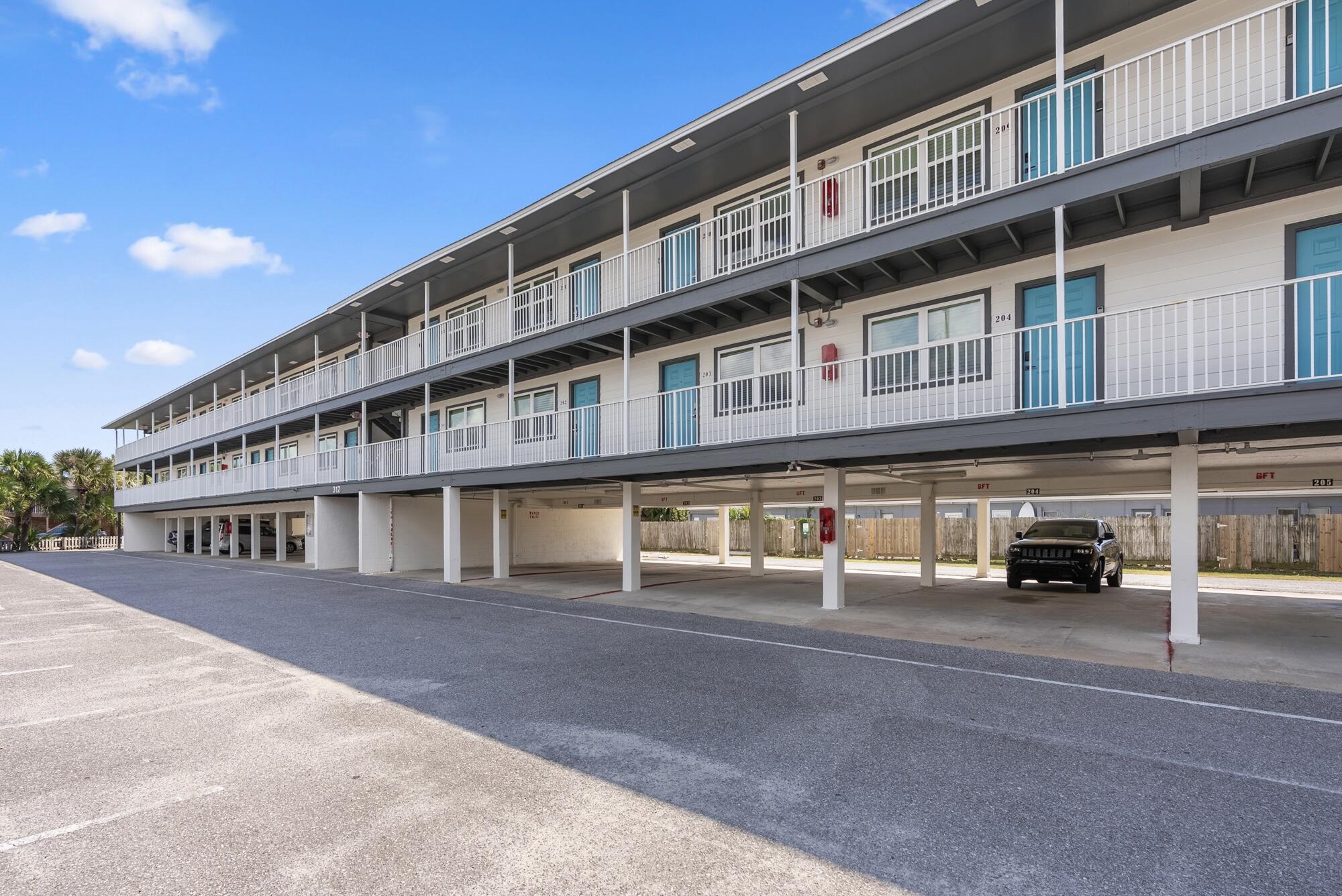 Fully furnished 1BR, 1BA condo on Okaloosa Island! Includes 1 covered parking space and additional guest parking, community laundry, BBQ grill, picnic area & cozy fire pit. Just a quick stroll to Blue Dolphin Beachwalk Access #1, perfect for beach lovers!