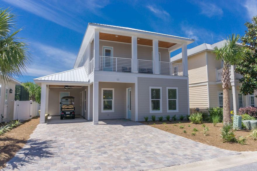 Like New! Custom built 4 bedroom 3.5 bath home with Carport. 2 Master suites, 1 en-Suite, and 2 living areas. 10' Ceilings and 8' Doors with Crown Moulding throughout. Carport has a nice size Storage closet with a locked conditioned closet inside for owner lock out if needed. This plan is very suitable for full time living or Investment for great rental income. Utility room on first floor and second floor. Kitchen has an under counter ice maker and beverage center in addition to the regular appliances.  Fenced with porch on the back as well as the covered Entry Porch and 25' long covered porch on the second floor. Tankless water Heater. Emerald Waters is a gated community with 2 pools and deeded Beach Access. Community is Golf Cart friendly (Note-this golf cart does not convey in sale).