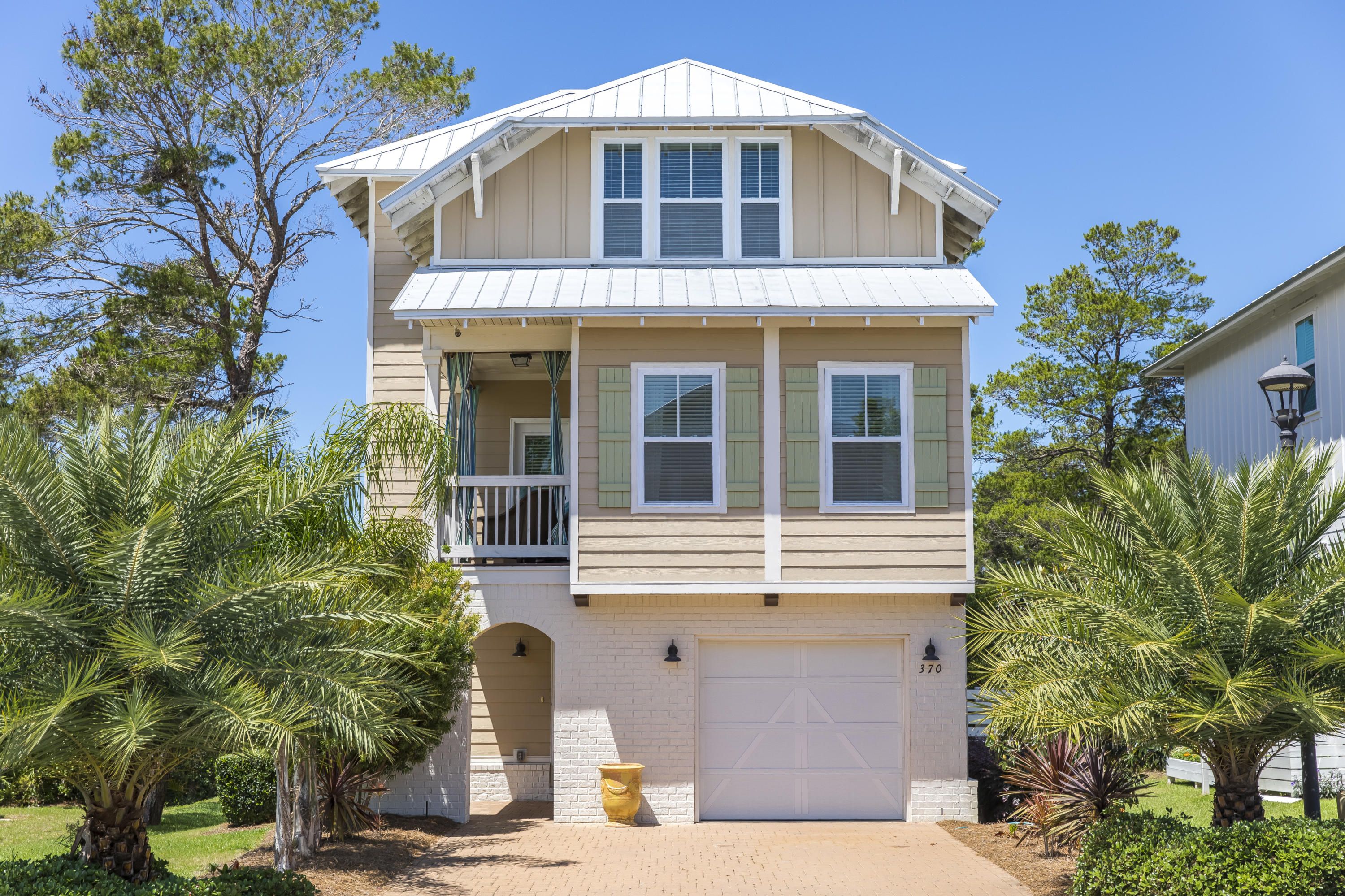 Boasting luxurious and custom finishes, this home offers a versatile and bright floor plan. In immaculate condition, it offers 3 bedrooms, 3 full baths, two living spaces and a one car garage. As you enter the home from the courtyard entrance the first floor has one bedroom, a large game room/office that can be converted as a 4th bedroom and a full bath. The second floor has a large Kitchen open to the Living room and Dining room, a covered porch, a bedroom and full bath. The Kitchen offers a gas range, granite countertops, stainless steel appliances, 42'' cabinets and a large island. The dining room has a custom built-in wine bar with lighting and storage. On the third floor the oversized master suite includes two large walk-in closets with custom built-ins and extra storage space.