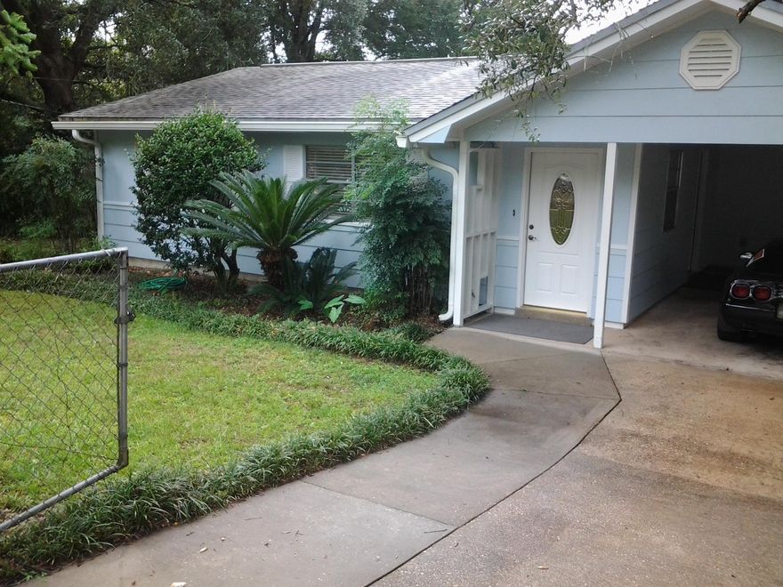 Beautiful setting, Large well landscaped lot and well maintained house. Owner pays for mow and blow of yard. This property is perfect for you. Three carpeted bedrooms, with tile though out the rest of the house. Gas cooktop in the kitchen with built in gas oven and broiler. Refrigerator stays but not warranted. Also washer and dryer available but not warranted. Sorry no pets allowed. NO SMOKING!  All adults intending to live at the property will need to fill out an application and be on the lease. Tenants required to carry renter's liability insurance.