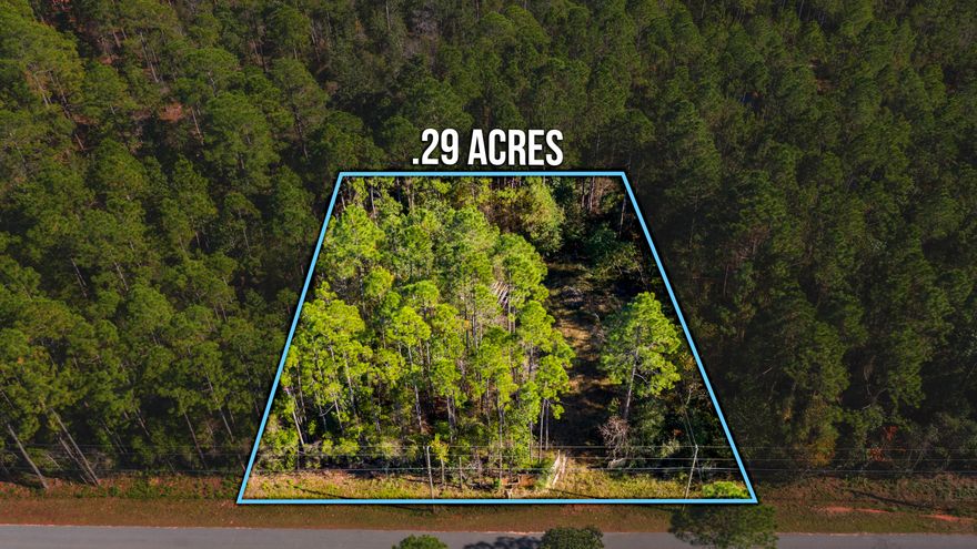 Looking for that fantastic property to build your dream home?  Needing a place to put the RV, or camper?  This is it! Quiet, secluded street so close to all the beach action. Partially cleared and ready to go, with woods on three sides. Mature trees, privacy, utilities, come with building plans!