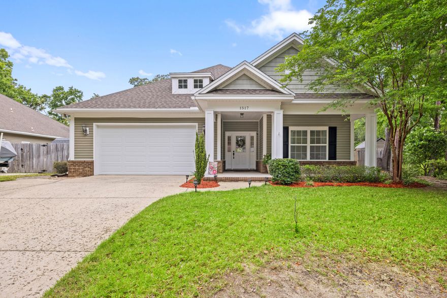 OPEN HOUSE SAT 5/17 10am-12pm Located in the heart of Niceville on just over a quarter of an acre corner lot, this 3-bedroom 2-bathroom Craftsman style home offers many extras and features a well-designed split bedroom floor plan that utilizes every bit of space perfectly. Beautiful mature landscape and an inviting large covered front porch will draw you right inside. After you move past the foyer, you'll find two spacious bedrooms, a quest bathroom as well as a separate office space that features French doors, plenty of built-in cabinet storage and a built in L-shaped desk. When entering the home through the garage, you'll be in the laundry room which includes a utility sink, tons of cabinets for extra storage, as well as convenient storage cubicles making this a perfect drop-off zone. The kitchen features white cabinetry, beautiful granite countertops, a large pantry, and an oversized island with plenty of eating space in the dining area. The kitchen is open to the dining and living room making it a perfect place for gathering. Located off the living room is the primary suite featuring a large walk-in closet, double vanities, a separate shower, and a soaker tub. You can use the French doors from the primary bedroom or the dining area to access an oversized covered lanai that spans the length of the house and is the perfect place to enjoy your morning coffee or entertain guests on the deck. The backyard offers so much privacy overlooking a wooded environmentally protected wildlife refuge and the space to add a double-gate for your boat or jet ski parking. 
Additional features of this home include: 2023 Roof, 2022 Hot Water Heater, 2017 HVAC, oversized 2-car garage, irrigation system, crown molding, wood laminate flooring, Cat 6 connections to each room, hurricane shutters, additional washer/dryer hookup in the garage. Built by Randy Wise. 
