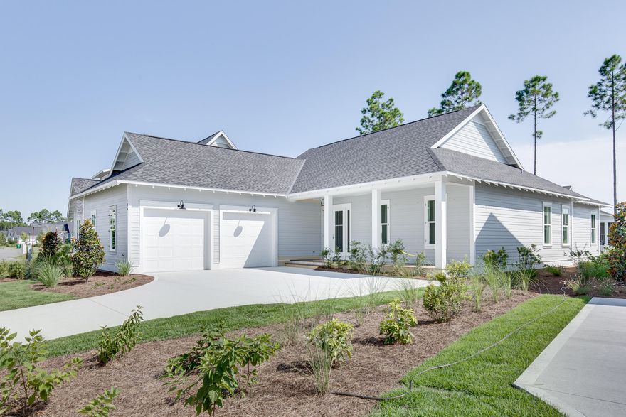 Now complete, this beautiful custom designed plan is the final new home opportunity from Huff Homes in Pathways! The floor plan offers four bedrooms, three and one half bathrooms, a two-car garage, and spacious porches. This new home offers many high-end features and upgrades including quartz countertops throughout, Medallion wood floors throughout, under cabinet kitchen lighting, solid core doors, and upgraded Wolf appliances including 24'' microwave drawer, Dual Fuel 30'' Range, Sub-Zero refrigerator with bottom drawer, Best 30'' Chimney vent hood and Asko dishwasher. Other upgrades include sound deafening insulation, handheld shower fixtures in all bathrooms plus additional cabinets in laundry area.