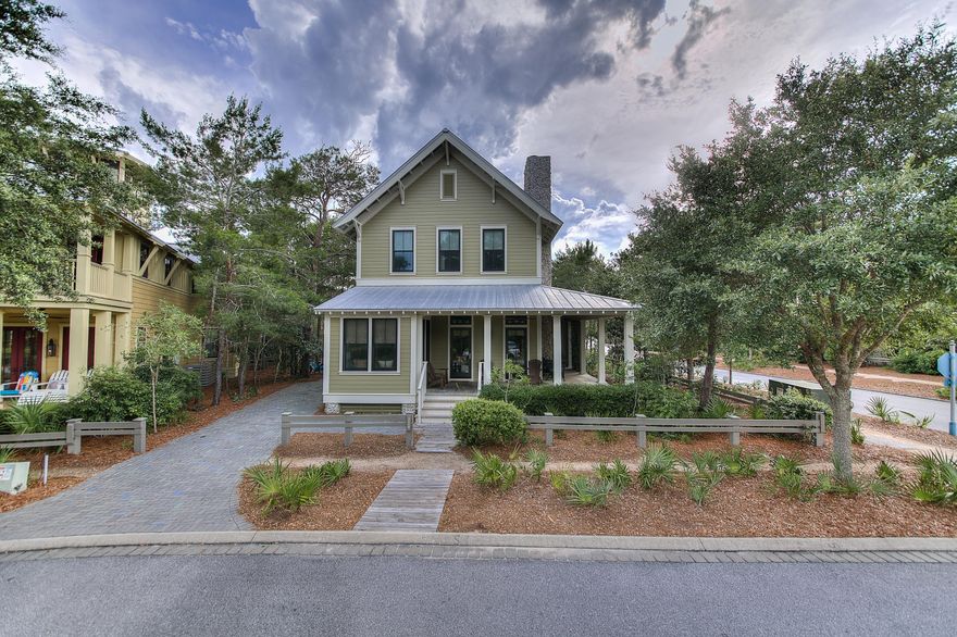 Beautiful WaterColor home on large lot that backs to green space and fronts a neighborhood park. This 4 bedroom + bunk room exudes the finest WaterColor has to offer with extensive outdoor spaces, beautiful finishes and functional floor plan. 2 owner suites, one of which is located on 1st level of home. This home has lots of charm, character and warmth. Lot is large enough to build a pool or carriage house. Property being offered furnished including golf cart and plans for a carriage home.