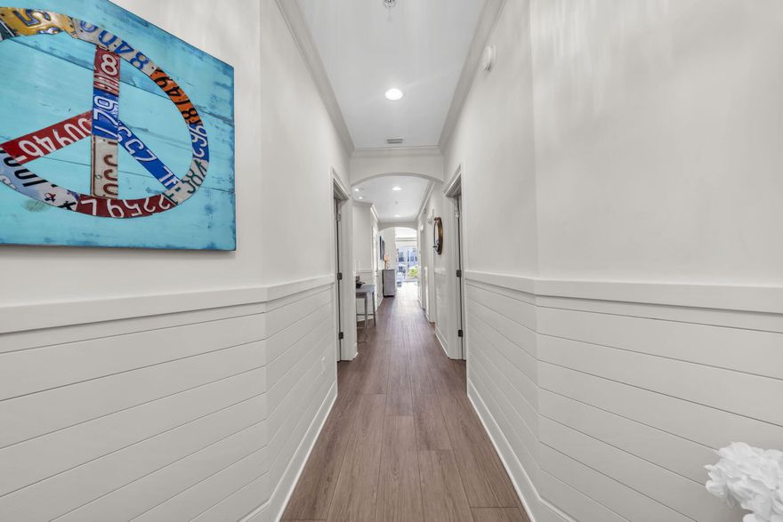 Step into coastal elegance at Adagio E103, a rare ground-floor Gulf-front residence in one of 30A's most sought-after luxury communities WITH deeded beach access. 75K in rental income already captured this year and there is still 3 months left to get more! This meticulously maintained 3-bedroom, 3-bath condo offers easy access and views of the pool AND is just steps from the sugar-white sands of The Gulf in Blue Mountain Beach. Inside, you'll find an open-concept layout with upscale finishes throughout, including luxury vinyl plank flooring, quartz countertops, and stainless steel appliances. The spacious master suite is complete with a Tempur-Pedic mattress and features balcony access, a spa-inspired ensuite bath with a soaking tub, double vanities, plus a separate shower decorated with magnificent tile. The entire condo was renovated last year from top to bottom which includes the kitchen, bathrooms, floors, tile, shiplap, all new furnishings, and a custom bunk room with individual TV's and charging stations-  there is nothing left for the next owner to do!  Enjoy outdoor living on your expansive patio - perfect for morning coffee or sunset cocktails. Adagio's resort-style amenities include a spectacular infinity-edge Gulf-front pool, a second 8,000-square-foot waterfall pool, hot tub, fitness center, and grilling areas, all in a gated, secure community. Whether you're seeking a primary residence, vacation retreat, or high-performing investment property, Adagio E103 offers the ultimate blend of luxury, location, and lifestyle.