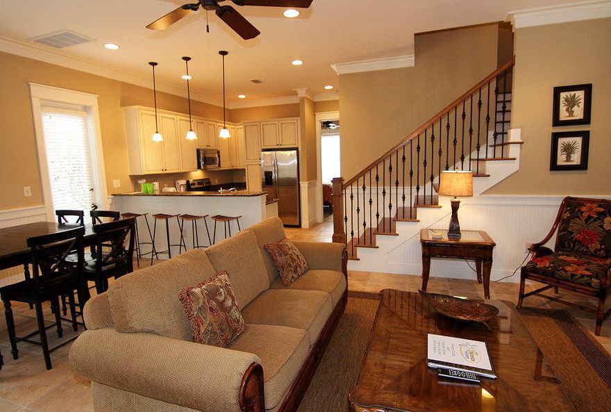 Charming - these Florida cottages are peacefully tucked away in the Sandestin resort. The Bungalos features a neighborhood pool and community putting green. Enter through the large screened porch with two sets of French doors opening into the living room. This home is complete with 10' ceilings, crown molding,stainless GE Profile appliances, granite kitchen and master bath counter tops. The first level features the living room, kitchen, powder room and master bedroom. Upstairs there are two large guest bedrooms, each with their own bathroom. This home is pre-wired for a whole-house audio/video network as well as remote controlled thermostat.