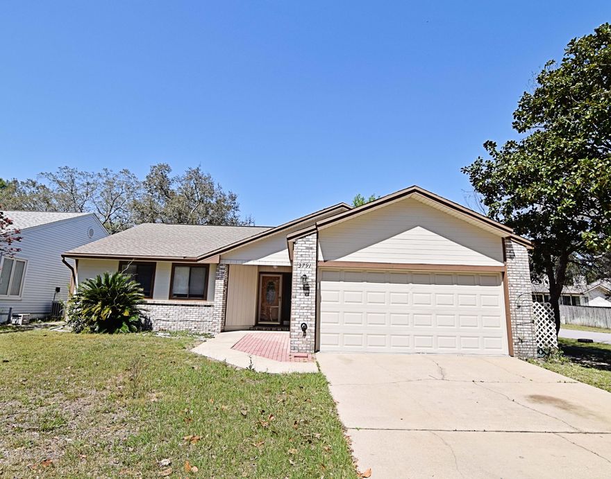 This home in is move in condition and ready for the next family!You will enjoy the large living room with the high vaulted ceiling and the beautiful brick fireplace, roomy enough for very large furniture. Open to the huge heated, cooled and tiled sunroom as well as the dining area, this home feels larger than the square footage shows. The kitchen is a cook's dream with fresh paint and granite and a beautiful backsplash. Newer stainless steel appliances include a 5 burner gas stovetop, oven, refrigerator and microwave. The master bedroom has a private bath and walk in closet. The additional 2 bedrooms share the hall bath. All bedrooms feature brand new carpeting. Stepping out of the sunroom to the outdoors, you will see the large patio perfect for summer grilling and entertaining.The fenced