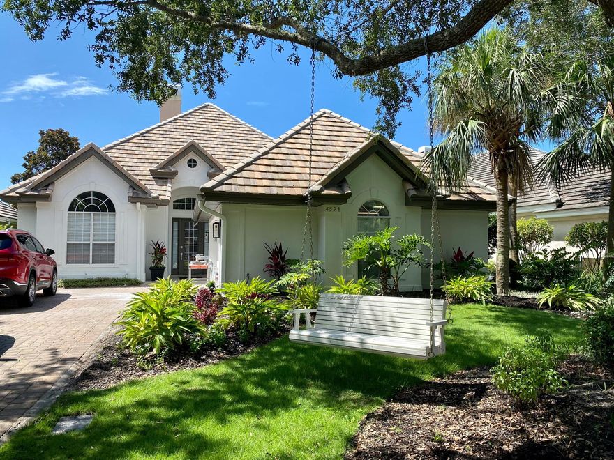 Entered for Comp Purposes. Single story living on a beautiful lake in Regatta Bay, a golf and yacht club community. Afternoon sunsets over the lake watching the colors change, you will enjoy consistent southern breezes from your back yard and screened porch. Three bedrooms and three full baths, this home is move-in ready. There is an additional half bath on the screened porch, should you want to add a pool and make that the pool bath. Contemporary kitchen design includes touches of gold, a spacious dining room and a huge island, which is perfect for gathering around with friends and neighbors. A modern fireplace centerpiece in the living room is not to be missed. Regatta Bay has a 25-yard lap pool, tennis courts, pickle ball courts, and golf.