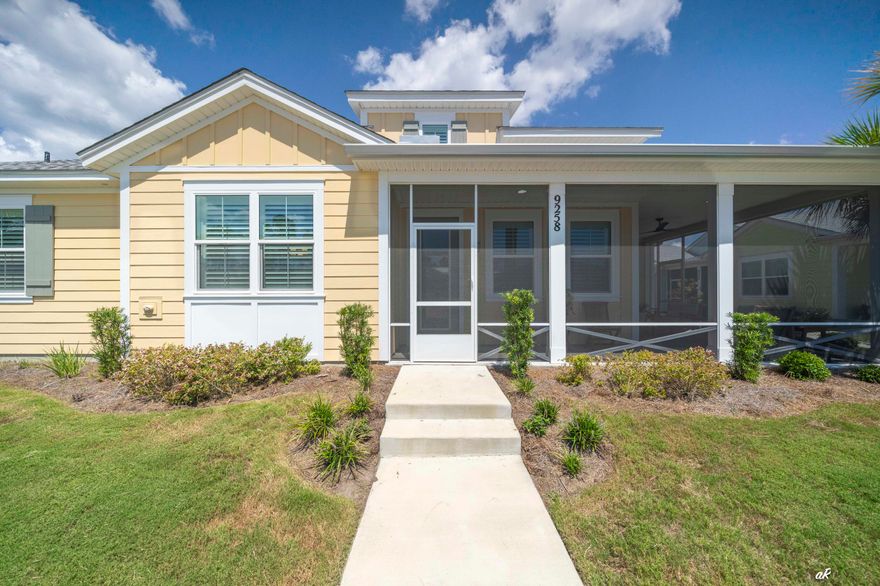 TURN-KEY. Buy it Furnished or without furniture, multiple options! Live the Margaritaville lifestyle at 9258 Cool Breeze Drive in Latitude Margaritaville at Watersound, a 55+ gated, resort-style community only 7 miles from the beaches. Welcome to your fully furnished Dreamsicle Cottage that sits on a desirable street-side lot in Phase 6A, one of the smallest phases where you have wonderful neighbors and no thru traffic. Step inside the coastal dreamlike cottage to find many extras from the custom plantation shutters on every window to the gourmet kitchen with all KitchenAid appliances (counter depth refrigerator, quietest dishwasher, gas range, & 600 CFM recirculating range hood), quartz countertops, 42" stained level II cabinetry w/crown molding, dovetail drawers and soft close drawers & doors and extended refrigerator cabinet w/panel.  The upgraded custom lighting in the kitchen, dining area and foyer enhances the elegance of the cottage.  The master bath is an oasis with its tiled shower with seamless shower door, quartz countertops, beautiful mirrors, level 4 tile floors, and cabinets over the toilet for added storage. The updated Mohawk RevWood flooring flows throughout the house.  The laundry room is equipped with Whirlpool washer/dryer and cabinets for extra storage.  Your guest will enjoy the bath that has tile walls, a beautiful glass tub enclosure, tile flooring and quartz countertops. Enjoy morning coffee or afternoon sunset views on the screen enclosed lanai.  The garage boasts Xylene floor coating, a mop sink, Gladiator shelves, FastTrack steel multipurpose storage rail systems,  2  20 amp golf cart outlets and a smart garage door opener. THIS HOME IS LOADED!   The balance of a 2 year Master Care Warranty from the original build/close date and a 10 year structural warranty is included. The HOA provides lawn care, exterior paint and roof replacement (on a schedule) and Fins Up! Gym access (excludes select classes).  Unmatched amenities: Latitude Town Square with bandshell for live music/events, Bar & Chill restaurant and Overlook Bar, resort style pool overlooking the Intracoastal Waterway and tiki huts, Fins Up! Fitness Center, pickleball, tennis, and bocce ball courts, Barkaritaville Dog Park, Port of Indecision kayak launch, Workin' N' Playin' Center. All connected by walking trails, sidewalks and golf cart friendly streets.  Located near medical, shopping, 30A, and ECP Airport. Come see this move-in-ready gem today!