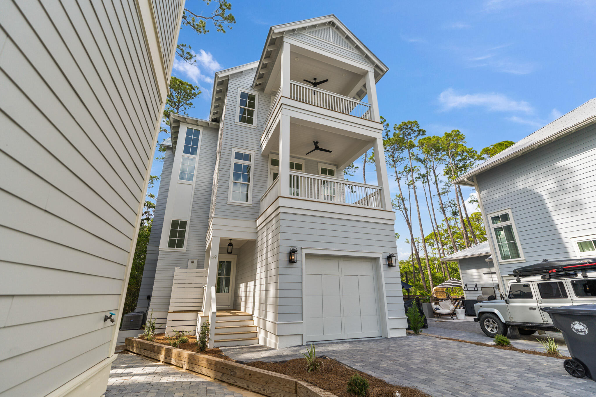 Welcome to 69 N Silver Maple, a distinguished residence nestled within the gated community of Treetops in Inlet Beach, Florida. This exquisite property offers a blend of comfort and convenience, ideal for those seeking a coastal lifestyle. With 2,803 square feet of thoughtfully designed living space, this home features four bedrooms, four full baths, and two half baths, providing ample room for family and guests. Upon entering, you are greeted by spacious rooms that seamlessly flow into large balconies and outdoor decks, perfect for entertaining or enjoying a quiet evening. The outdoor shower is a practical addition for rinsing off after a day at the beach. The property also boasts ample driveway space, accommodating multiple vehicles with ease.
The home includes a versatile bunkroom, catering to additional sleeping arrangements or flexible use as needed. Residents of Treetops enjoy access to a community pool, enhancing the leisure opportunities available within this serene enclave.
Location is key, and this property offers a short walk or bike ride to the vibrant Rosemary Beach and 30Avenue, where a variety of shopping and dining options await. The deeded beach access and tram service ensure convenient access to the stunning 30A beaches, allowing you to fully embrace the coastal experience.
This property is an excellent opportunity for those seeking a home that combines modern amenities with the charm of a beachside community. Explore the potential of 69 N Silver Maple and envision your future in this desirable location. Contact us today to schedule a viewing and discover all that this exceptional home has to offer.