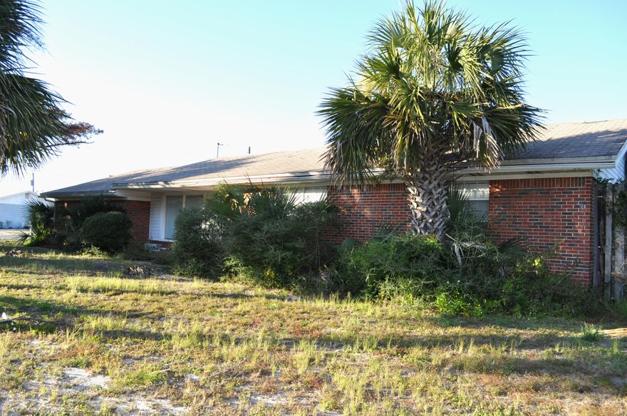 Okaloosa Island single family home! 446 Caviar Drive boasts a large corner lot and an all brick ranch home. Enjoy close proximity to the world's most beautiful beaches! 3 large bedrooms, 2 full bathrooms, 2 separate living areas, formal dining room, indoor laundry room and a 2 car garage! Make 446 Caviar Drive your Island home today!