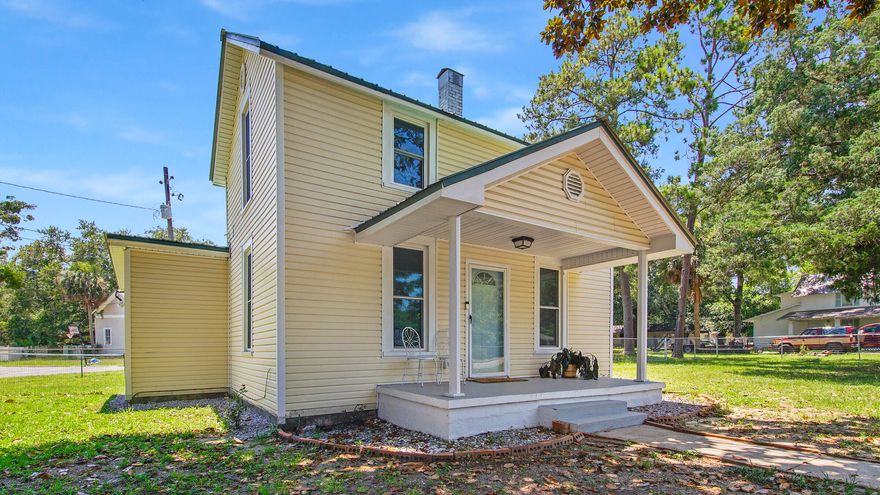 Quaint newly renovated cottage in the heart of downtown DeFuniak Springs in the historic district, only 1-2 blocks to Lake DeFuniak on a 1/3 acre corner lot. New paint, new luxury vinyl plank flooring and a brand new fully renovated downstairs bathroom. The kitchen is fresh and clean with white cabinets and new countertops and newer appliances as well. Charming beadboard ceiling in the dining and kitchen with a large utility room leading to the back yard and carport. One bed and one full bath downstairs; upstairs is the master bedroom with walk-in closet and sitting/landing/loft area that could be used as a dressing area, office, etc. Just across from Walton Middle School and Lake DeFuniak, the location can't be beat. These small historic homes are highly sought after - so don't miss out!
