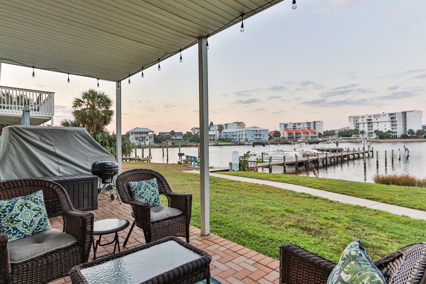 Fantastic Destin Harbor Views!! One of only 5 units with direct Harbor views in complex and this unit is the only one in Destin Sands Complex that has TWO sets of sliding glass doors for maximum viewing of the harbor! It also has the widest patio in the complex for great outside entertaining and easy access to walk out to your boat, fishing off the dock, watching dolphins swim by, watching summer fireworks show weekly, or catching the Water Taxi to hit the harbor restaurants. Minutes to the beach! Unit 104 has been nicely renovated to include: tile floors in main living areas with crown molding, remodeled kitchen with higher cabinets, granite counters and stainless appliances.  Bedroom windows as well as front door have been replaced. Both bathrooms have been remodeled.