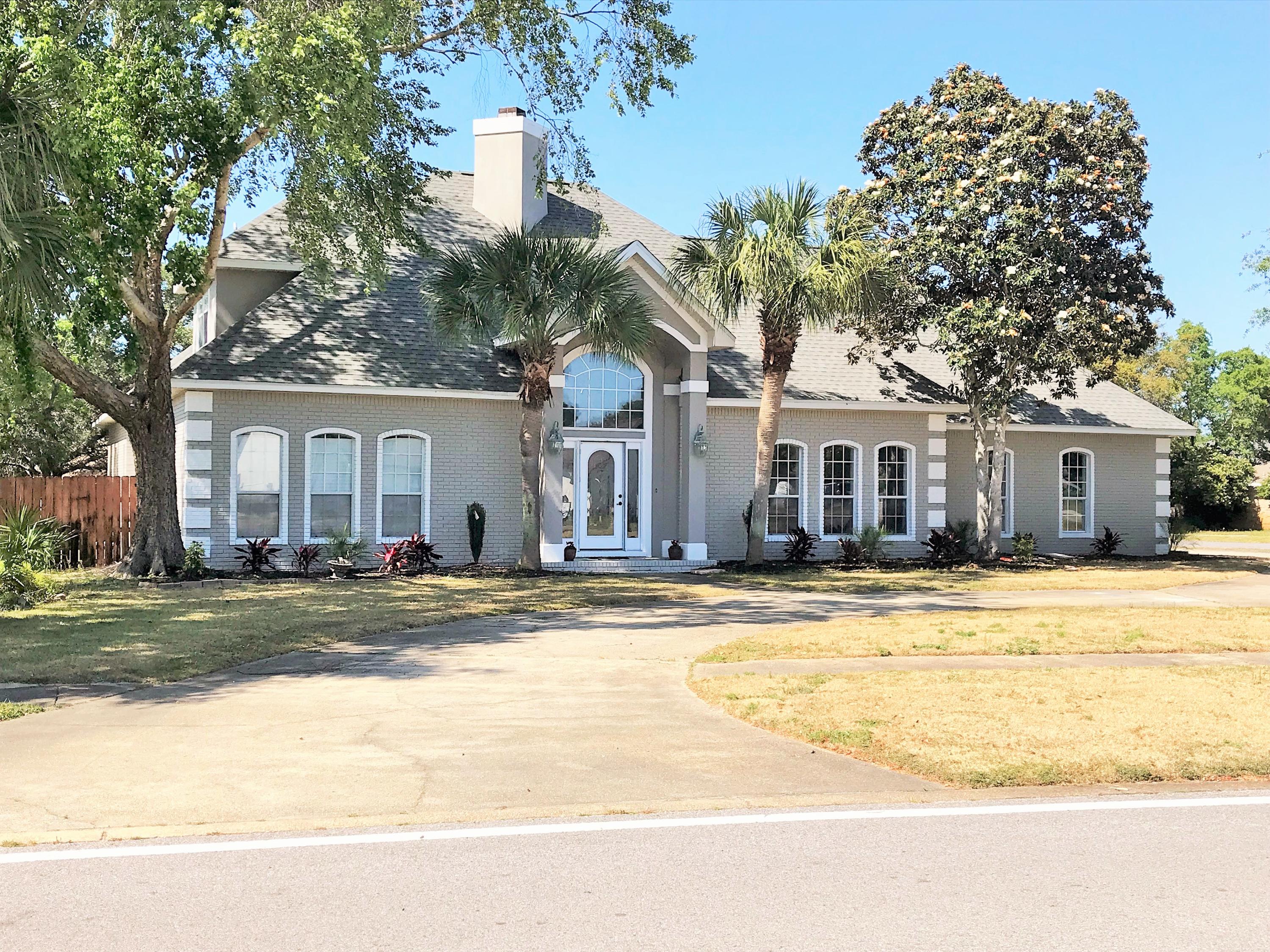 Spectacular entry with beautiful wood ceiling soaring up above the wrought iron staircase. Leaded front door allows plenty of light to showcase a grand foyer. Located in the prestigious Indian Bayou neighborhood with ample room for a large family. Many custom features with crown molding, wood flooring, granite kitchen counters and tile backsplash. Relax on your beautiful enclosed back porch that's large enough to entertain many guests.