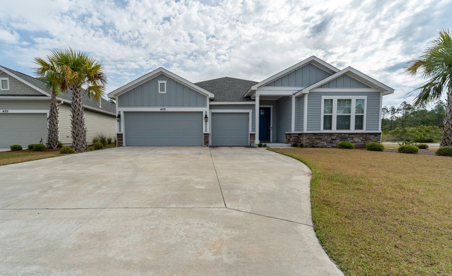 Incredible Price Adjustment for this Tracewood floor plan home! Low price for similar homes in Breakfast Pt. This 4 Bdrm 3 Bath with bonus room that could be 5th bedroom is move-in ready. Situated on a premium substantial-sized corner lot that backs to a wooded area and overlooks a large open green space, enjoy your privacy while having easy access to everything from high-caliber schools to beaches, shopping and restaurants. The spacious kitchen with a center island has new top of the line cabinetry and features premium stainless steel appliances and granite counter tops along with new flooring throughout the home. The open floor plan has a master suite that is like a retreat! En suite includes double vanities, walk in shower, walk in closet with customized shelving and storage that is