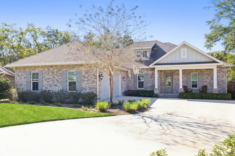 Beautiful Brick/Hardie Craftsman style home located 1.1 mile drive outside Eglin AFB East gate in the newer community of Portugal Cove. This home has 4 bedrooms, 3 full baths plus a flex room. The flex room can be used as a study or additional dining area. You will love all the extra storage inside and out. Don't miss the outdoor storage room. The home is fully fenced and situated on over a third of an acre. There is plenty of outdoor space for entertaining with a covered porch and open deck. The home includes many energy efficient features including a tankless water heater. The Porch is plumbed for a gas grill and is wired for a TV. Portugal Cove is a community of only 15 homes built around a circular street. Buyer to verify all areas of importance including lot size and room dimensions.
