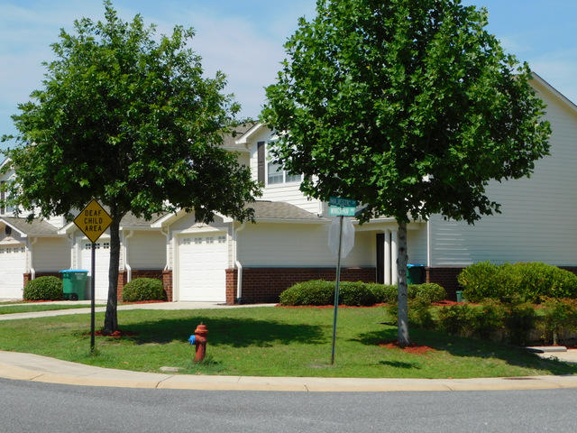 Townhome is vacant. Great investment property or place to call home. There is a community pool and play ground within walking distance and the grounds are very well cared for, throughout the neighborhood. The inside of the Townhome is in great shape and is ready to go. Upstairs is the 2 bedrooms and 2 bathrooms. Both bedrooms have their private bathroom. The main level has the half bath, laundry room, kitchen , dining area and living room.