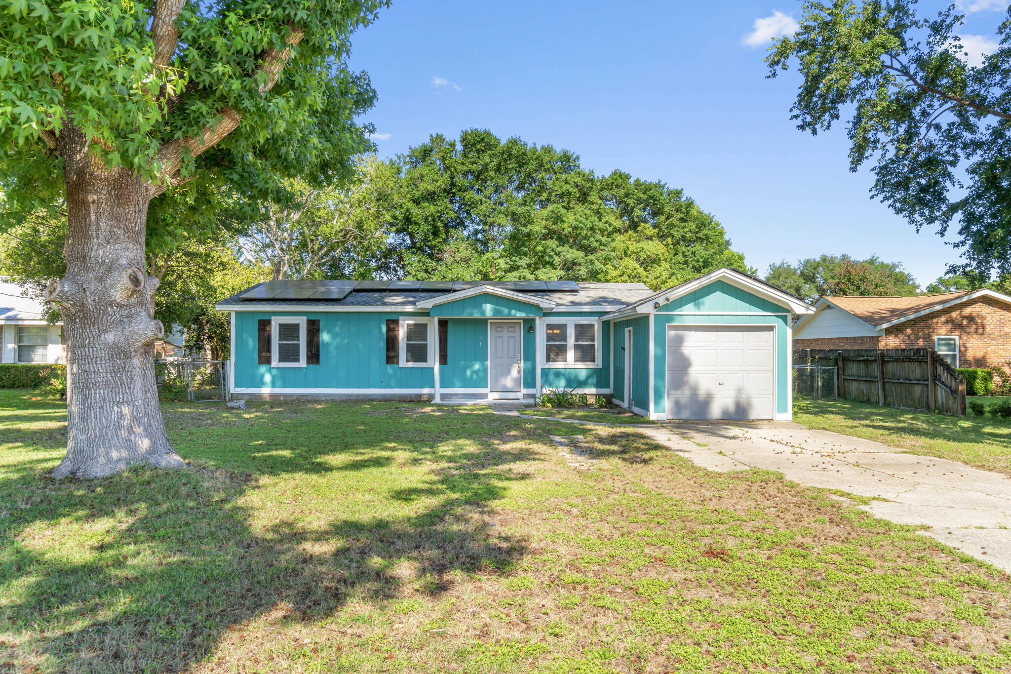 Discover your move-in ready gem in Mary Esther! The home's recent upgrades include a newer roof and windows (2018), a water heater (2016), plus solar panels installed in 2020 and 2023, all under a 25-year warranty. The seller is covering the cost of the solar panels at closing, so you can enjoy energy savings from day one!Whether you're a first-time homebuyer or an investor looking to expand your portfolio, this home is a fantastic opportunity. Located just under 10 miles from Hurlburt Field and the stunning Emerald Coast beaches, this property has it all!Inside, you'll find a versatile flex room ready for your personal touch--perfect as a home office, gym, or playroom. The spacious front and back yards provide ample room for outdoor fun, gardening, or parking your RV or