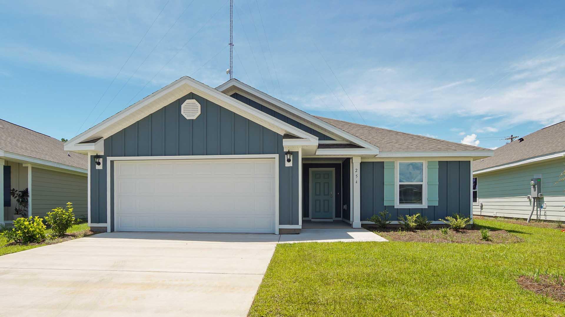 Welcome to 254 Gray Owl Drive, a new home at Owl's Head Farms in Freeport, Florida. This home is currently under construction and features the Lismore floor plan. The foyer opens to a bright living space, with two secondary bedrooms and a full bathroom tucked off to one side. These rooms are perfectly sized for guests, children, or even a home office, with each offering plenty of closet space and easy access to the shared bath. This home featuring modern finishes and engineered Vinyl plank flooring throughout the home except for the bedrooms where you'll find plush carpet.
Continuing into the home, the hallway leads you to the spacious, open concept living area. Here, the kitchen truly shines with its granite countertops, stainless steel appliances, and an island with a breakfast bar that creates the perfect spot for casual dining or entertaining. The adjoining dining area is well-positioned for family meals, while the living room offers a comfortable space to relax.
Privately located at the rear of the home, the owner's suite offers a peaceful retreat. The large bedroom is complemented by a luxurious ensuite bathroom, featuring a dual vanity, a walk-in shower, and a large closet designed for all your wardrobe needs.
The patio at the back of the home provides the perfect place to enjoy outdoor living, whether sipping your morning coffee or unwinding in the evening. The Lismore floorplan balances style and function, making it a versatile choice for families of all sizes. Schedule your tour of Owl's Head Farm today.