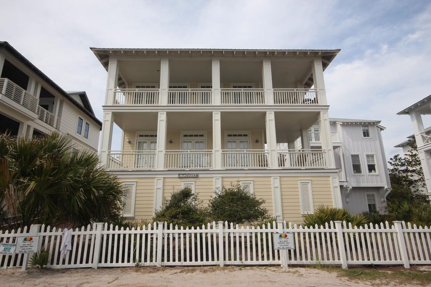 Foreclosure!Just steps to the gorgeous, white sand beaches of the Emerald Coast! This fully furnished & beautifully appointed home offers 4 bedrooms and 4 1/2 baths with gorgeous pine floors, high beamed ceilings, crown molding & cozy gas fireplace. 2 spacious balconies to enjoy the beautiful views & lovely Gulf breeze. Beach access is right next to the house or you can use one of the two pools available to you! The kitchen is a chef's delight with plenty of granite counter space, stainless appliances, breakfast bar with 2nd sink & wine refrigerator. Lots of windows throughout give the home a feeling of abundant space & light. There is a shower to wash away the sand on the lower level & tons of storage.This home will comfortably sleep 12 and is ready for immediate occupancy. Don't miss ou