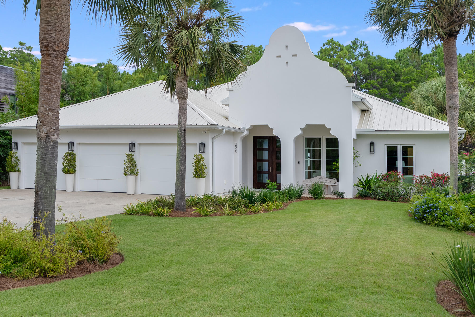Experience the height of luxury coastal living at 220 Seacrest Drive, a 4-bedroom, 4-bath architectural gem in the heart of Inlet Beach. Just steps from the Gulf and free from the constraints of an HOA, this home blends timeless design with modern sophistication for an effortless, beachside lifestyle.Inside, white oak floors and custom oak accents set a warm, refined tone, while walls of windows flood the interiors with natural light. The chef's kitchen is a showpiece, anchored by white quartzite countertops, a 36' dual-fuel Wolf range with pot filler, Sub-Zero refrigeration, Cove dishwasher, ice machine, and walk-in pantry, perfect for entertaining or everyday ease.Three of the bedrooms enjoy their own private, designer baths, while the fourth bedroom is served by a separate bath. The fourth full bath is located outside, designed as a functional, beach-friendly pool bath. Finishes include Zellige Pearl White tile in the master shower and Seaside Limestone accents inspired by the area's most exclusive coastal builds. Throughout the interior, polished nickel fixtures add a gleam of elegance.
Outdoors, a hot-and-cold shower with side-yard access keeps sand where it belongs. Recent upgrades include impact glass front and patio doors, replaced windows, and new gutters and downspouts for peace of mind.
The 3-car garage offers abundant storage for bikes, boards, and beach gear. From here, it is a short stroll to the sugar-white sand and turquoise waters, with top-tier dining, shopping, and 30A attractions minutes away.
220 Seacrest Drive is more than a home. It is a rare opportunity to own a thoughtfully designed, move-in-ready coastal retreat in one of Inlet Beach's most coveted locations.