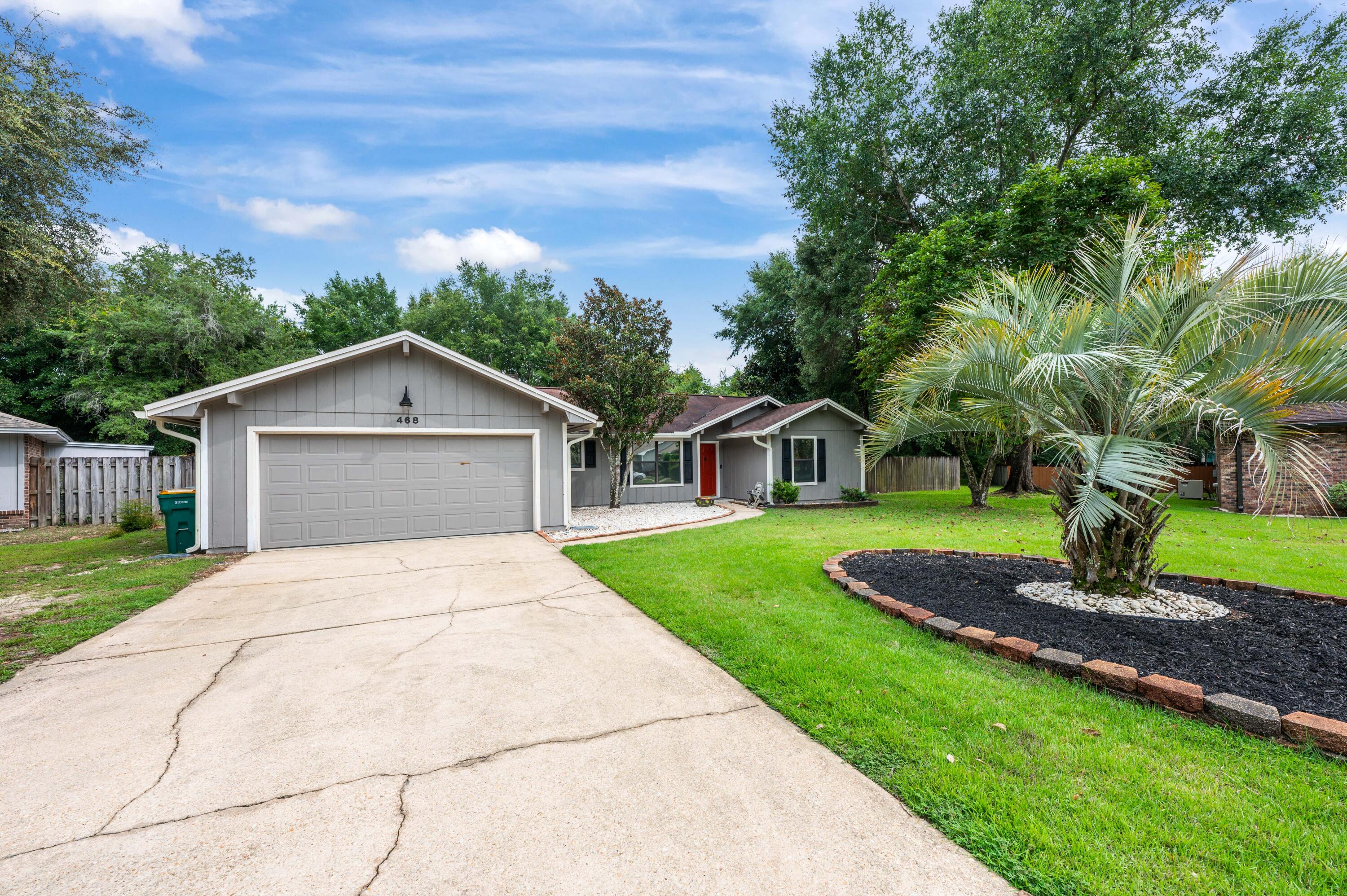 'Seller will pay up to $10k for 2 points towards your interest rate buy down.'3 bedroom 2 bath split floor plan, plus bonus room in Bluewater Bay with .39 acre spacious yard. The sellers will install a new architectural shingle roof with accepted offer before closing. The sellers have updated this house with a 10X 25 room that can be used as an office or a nice sitting area over looking the spacious back yard. The Kitchen was updated with painted cabinets new cabinet hardware, LVP flooring, new granite countertops, new tile backsplash, new lighting fixtures, new stainless stove, microwave. The living room was updated with new LVP flooring, painted fireplace, and new lighting. The master bedroom is 14.5 X 14.5 with LVP flooring and has it's own door way to the screen porch out back.