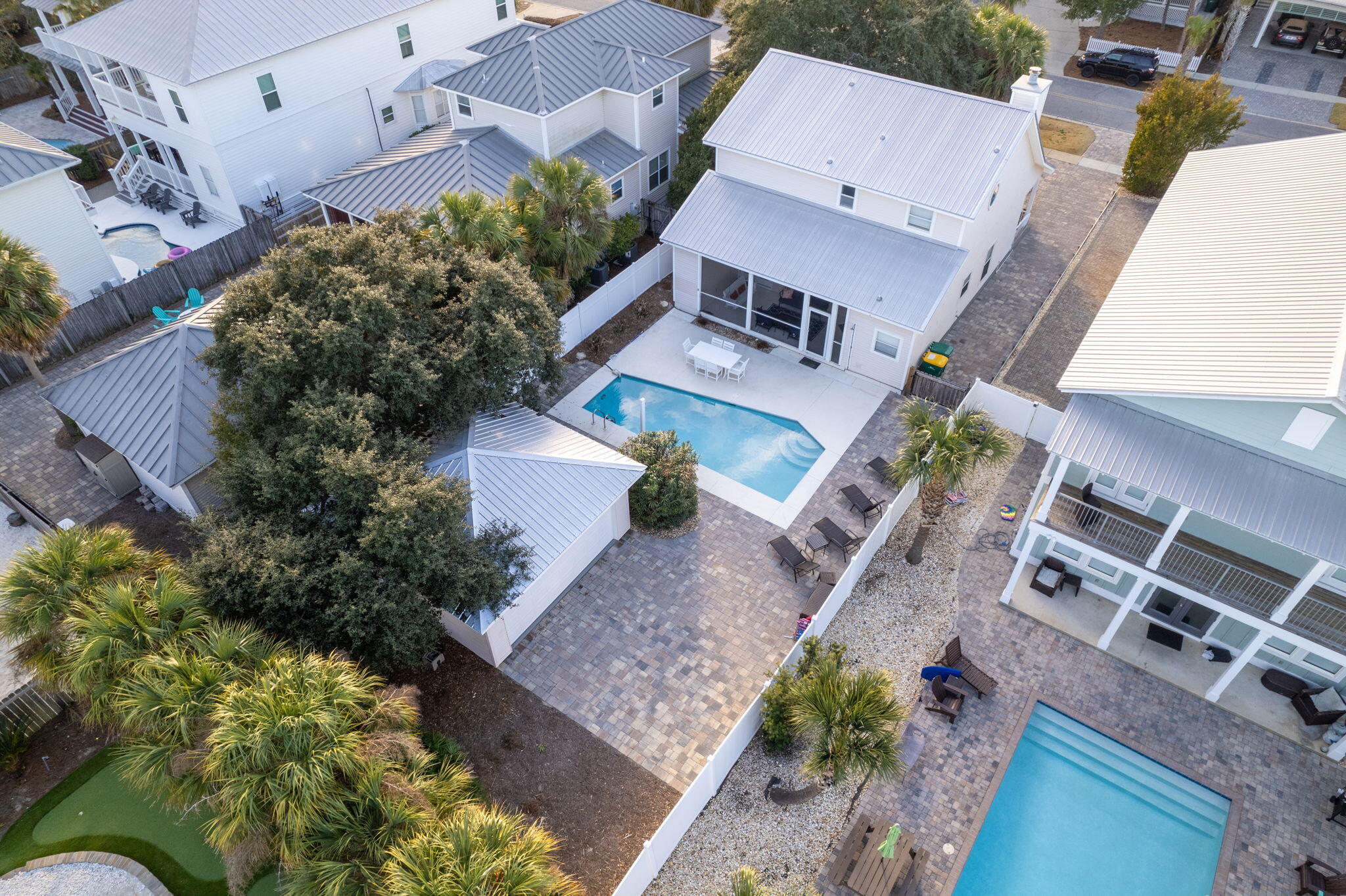 New NEW Price. Sold Fully Furnished with bookings for summer in place. Escape to your coastal paradise in this idyllic 1838 sq ft residence conveniently situated at 97 Barracuda, in the heart of Destin, Florida, one of the most desirable locations in the Gulf of America. NO HOA! This beautifully maintained home encompasses 3 expansive bedrooms, notably including a first-floor master suite, and 3 full bathrooms. Dive into comfort as you enter a turnkey home, fully furnished to enliven your stay. .The outdoors is just as inviting as the inside with a screened-in back porch perfect for lounging and enjoying the balmy Florida evenings. Plunge into your private pool after a day at the beach, located just a block away. With a large garage, there is adequate- more- or potential for a carriage house.This enchanting residence also boasts beach access and plenty of beach toys at your disposal. For the golfing enthusiasts, a golf cart is included to make your way around the Crystal Beach area, adding to the charms of this property. A sturdy metal roof adds to the resilience and longevity of the home.As an established vacation rental, this property offers an appealing rental income opportunity. Local amenities, including boutique shopping and fine dining venues, are within a stone's throw enhancing its rental attractiveness.Live, relax, and revel in the ultimate Floridian lifestyle in this comfortable abode. Don't miss out on this exceptional opportunity to invest in a sought-after Crystal Beach property. Interested buyers are invited to schedule a showing and experience firsthand what this incredible residence has to offer. Contact us for more information and embark on your journey to coastal living today.