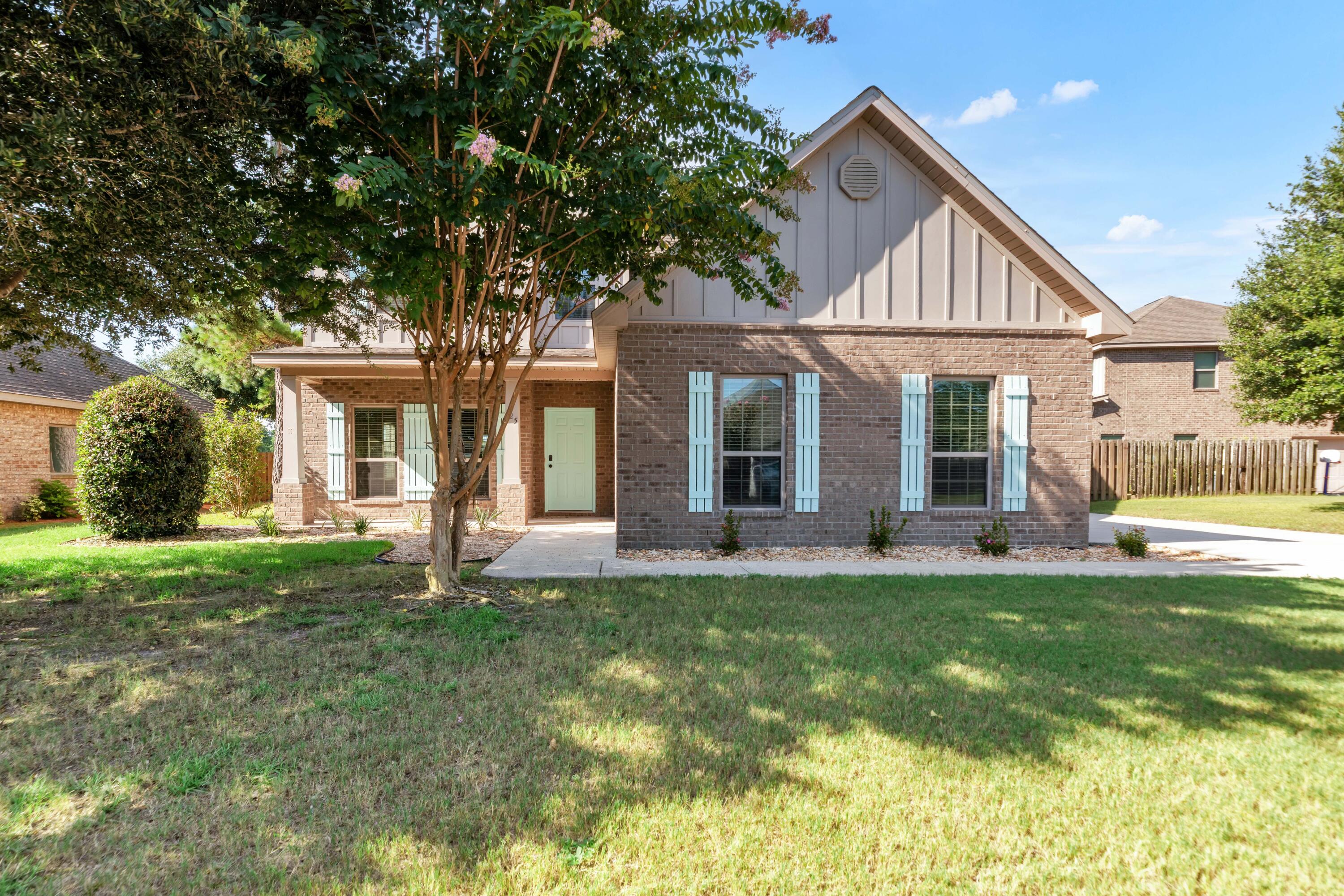 Lake front in Hammock Bay! This home boasts a large great room, ground floor master bedroom, large yard and extra-long driveway for plenty of parking. This well laid out floorplan has 4 bedrooms. The large bedroom upstairs could also be used as a teen/game room: there are plenty of options. The living area is open and bright. Kitchen features granite counter tops, stainless steel appliances, and a large kitchen island. All appliances included in the kitchen. The large primary suite offers views of the lake. Primary bath features large tile shower, split vanities with granite counters. Out back enjoy the patio with views of the lake or walk down to the water and try your luck catching a bass or pan fish. The fenced back yard is perfect for family bbq's and enjoying the great outdoors! The Passages neighborhood in Hammock Bay is a short walk to all amenities including Canine Commons (the dog park), three swimming pools, the hammock bay clubhouse, tennis, basketball, pickle ball courts, the amphitheater, brewery and 60 acre sports complex! Hammock Bay has a full time Event Coordinator for weekly activities, festivals, farmers' markets and entertainment! 125 Whitman also has an individual mailbox for your convenience. Buyer to verify all information impt to them.