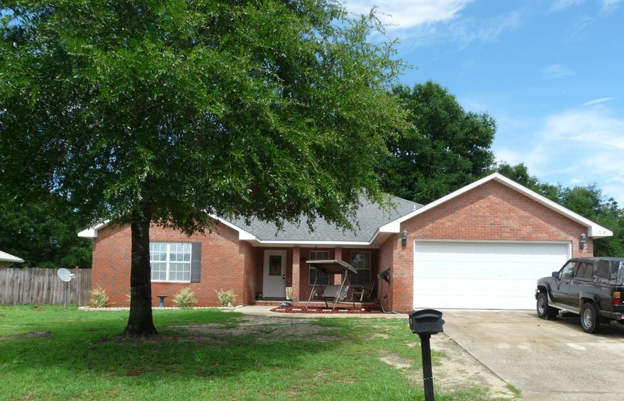 Wonderful home in Wonderful neighborhood !! New flooring throughout -tile in wet areas and laminate in other areas! Master shower newly tiled. Soaking tub included in Master bath. All Kitchen appliances included. Nice Breakfast Bar and table area for large family. Double French doors in Huge Living room (20x16)allowing a lot of light into the home. Bedrooms included huge Master of 19x14 with Walk In Closet and Master Bath. 3 other bedrooms are great size and use large second bath. Two have walk in closets also. Level yard in front and back and mature trees. Backyard fenced and has separate area fenced for garden. Includes the two car garage. Really nice home! Buyer to verify all measurements.