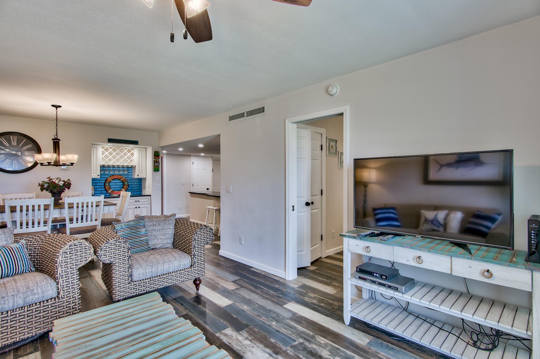 This condo checks all the boxes...gulf front, completely remodeled, great rental potential and THE PRICE!!!! Everything from the sheetrock out is new including kitchen cabinets, appliances, granite countertops, glass backsplash, wood tile floors, washer/dryer, walk in shower and more! You really feel like you are walking into a brand new condo. This 2 bedroom 2 bath is fully furnished and ready to rent. Holiday Surf and Racquet Club is an established property with a solid rental history. If you're looking for a unit with fantastic rental potential this is it. Plus, you can't beat the location with a large deeded beach and just a quick drive to the harbor.